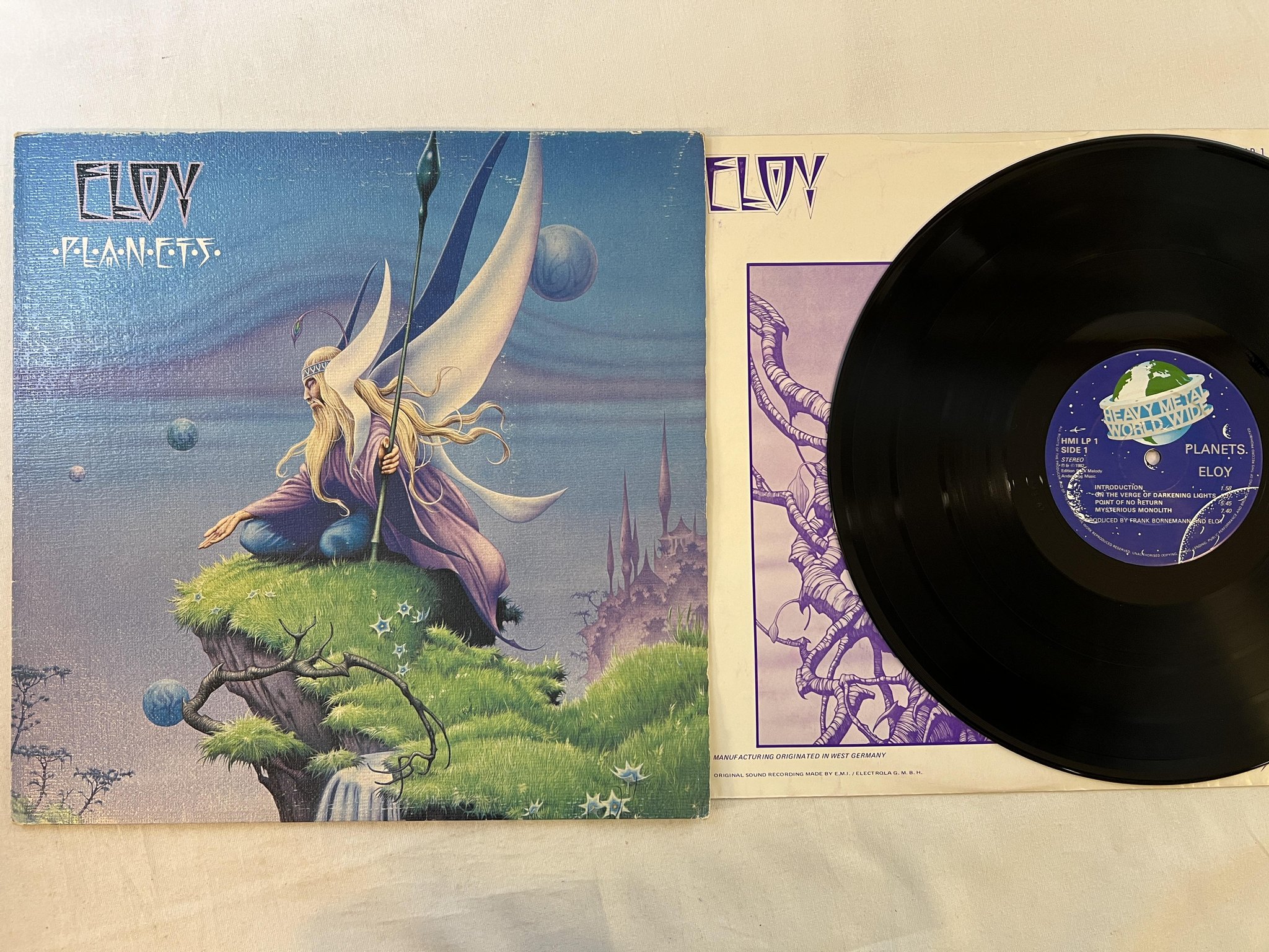 Omslagsbild för skivan ELOY planets LP -82 UK HEAVY METAL WORLDWIDE HMI LP 1 ** prog rock **