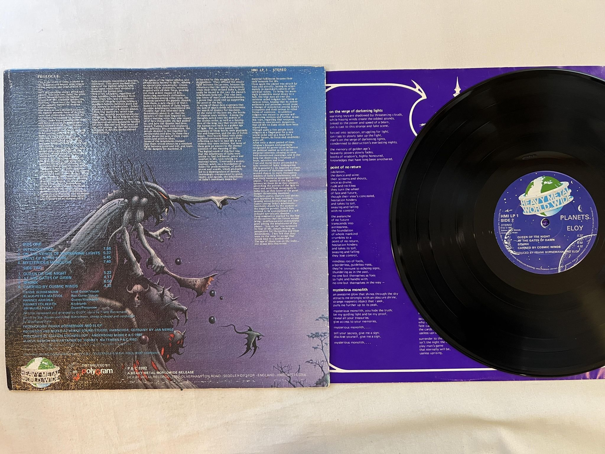 Omslagsbild för skivan ELOY planets LP -82 UK HEAVY METAL WORLDWIDE HMI LP 1 ** prog rock **