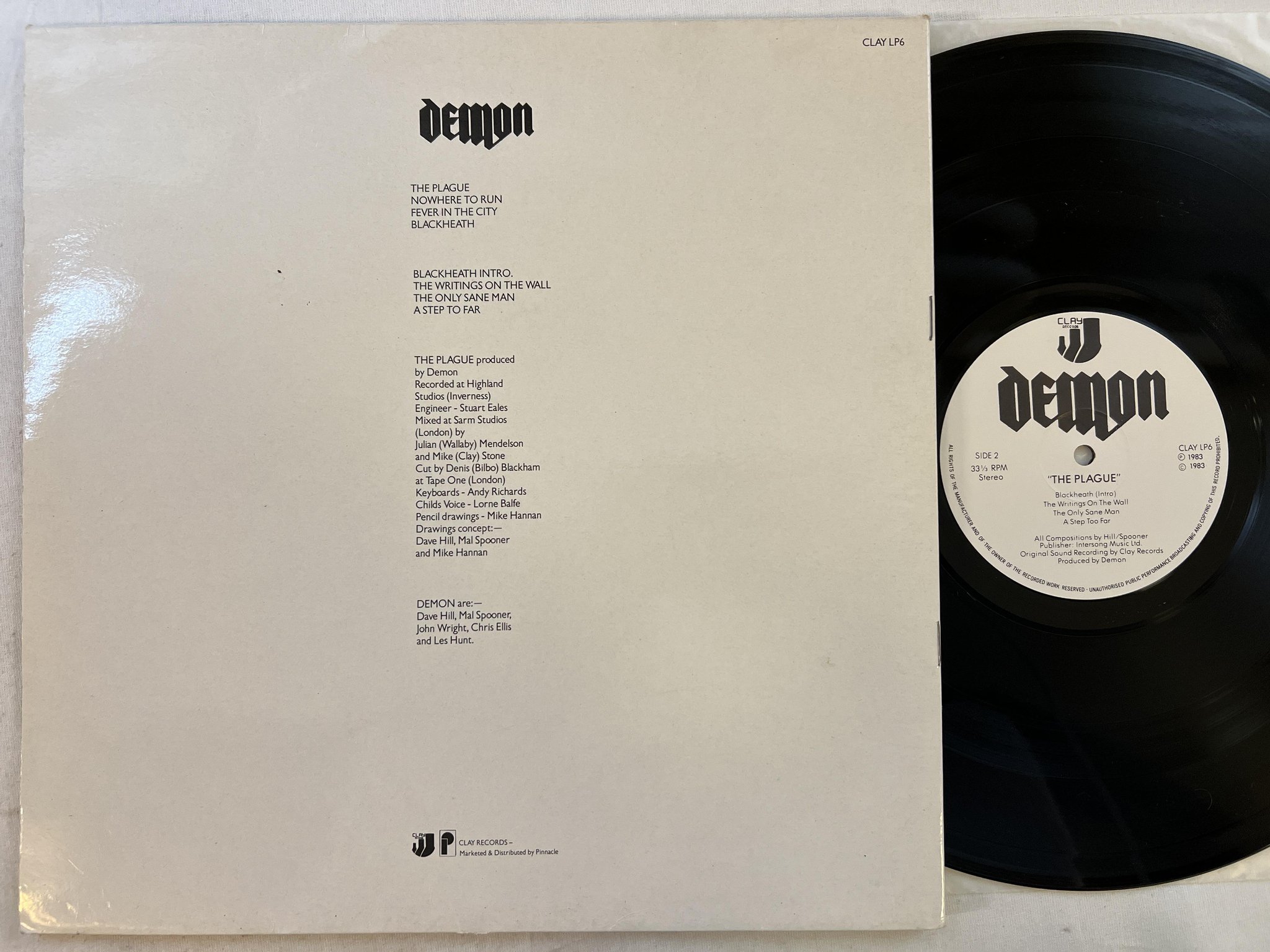Omslagsbild för skivan DEMON the plague LP -83 UK CLAY LP6