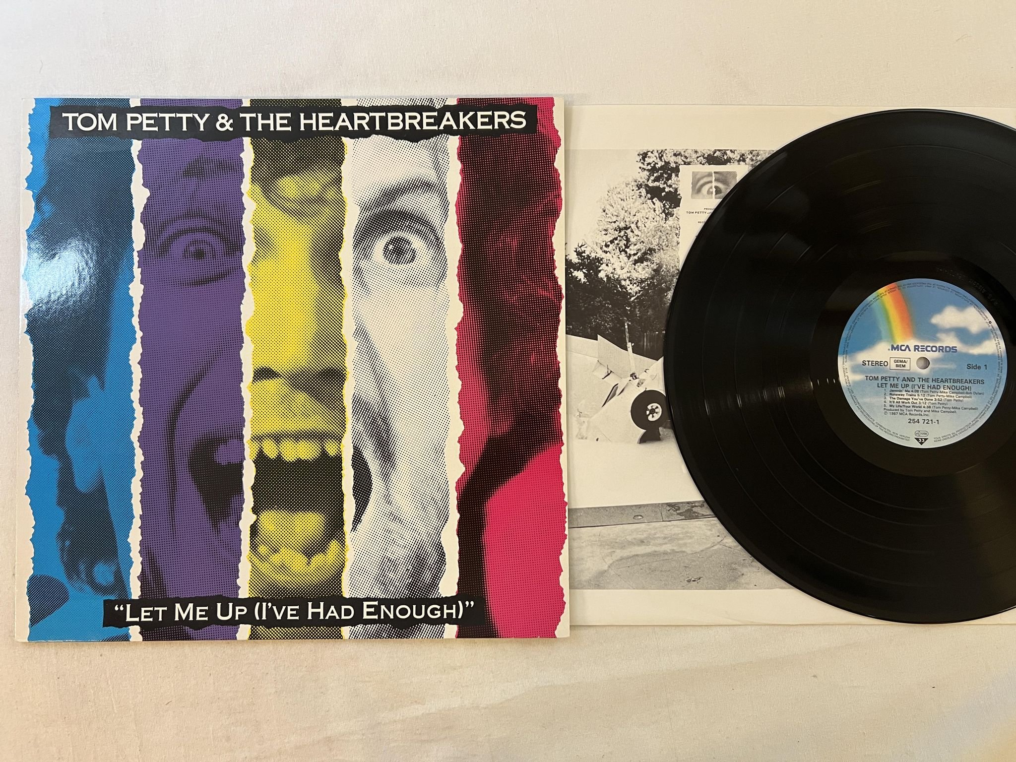 Omslagsbild för skivan TOM PETTY & THE HEARTBREAKERS let me up LP -87 Ger MCA 254 721-1