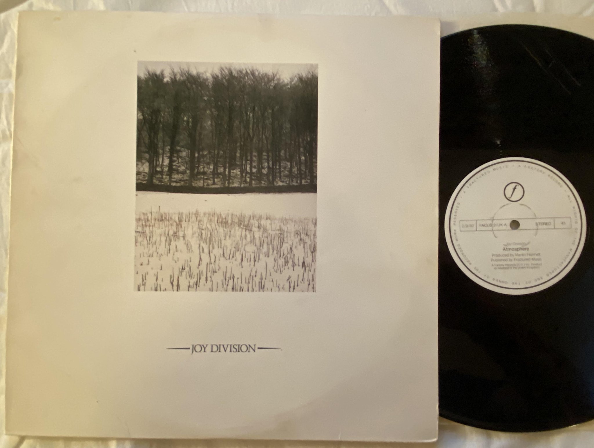 Omslagsbild för skivan JOY DIVSION atmosphere 12"single UK FACTORY FACUS 2 ** red translucent **