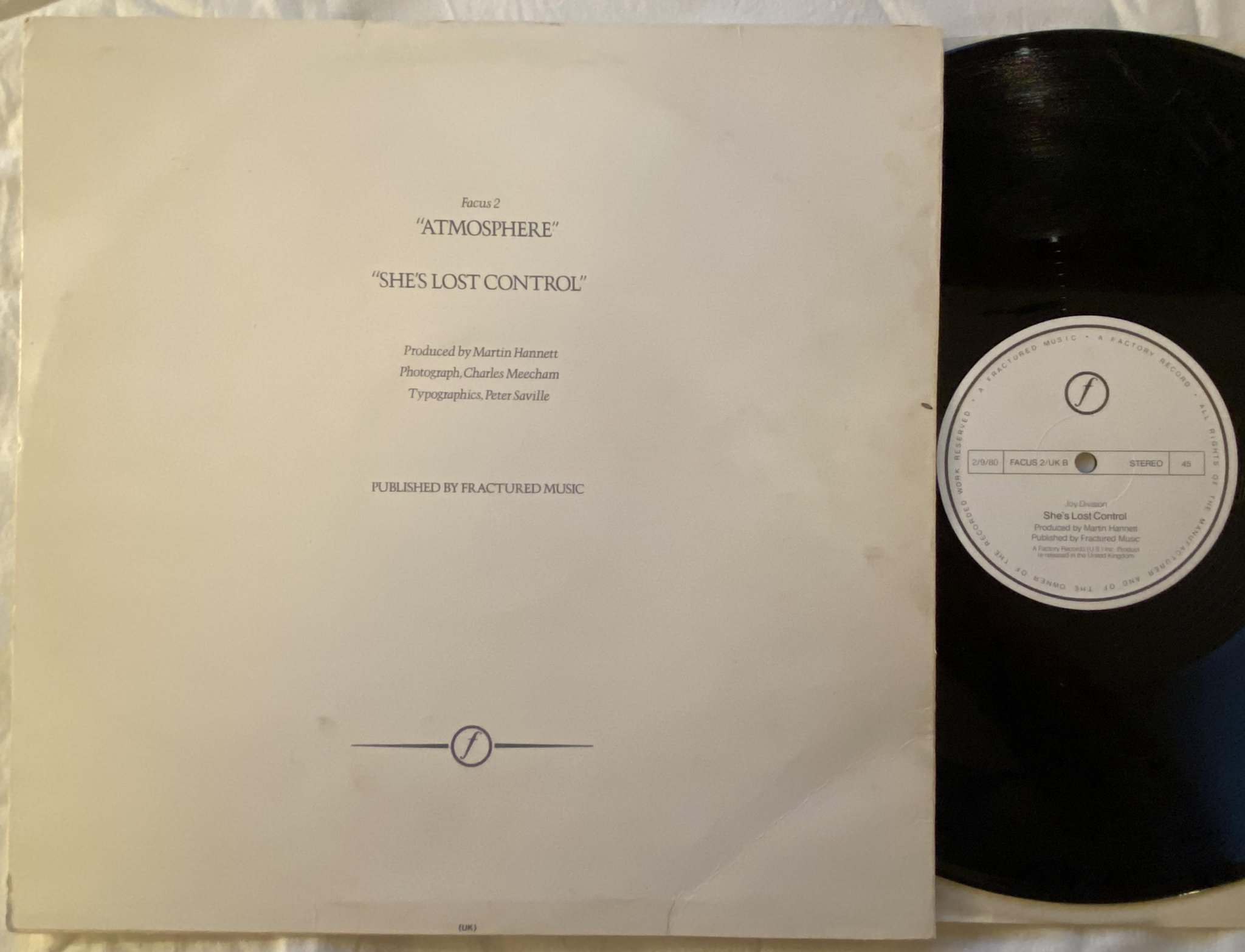 Omslagsbild för skivan JOY DIVSION atmosphere 12"single UK FACTORY FACUS 2 ** red translucent **