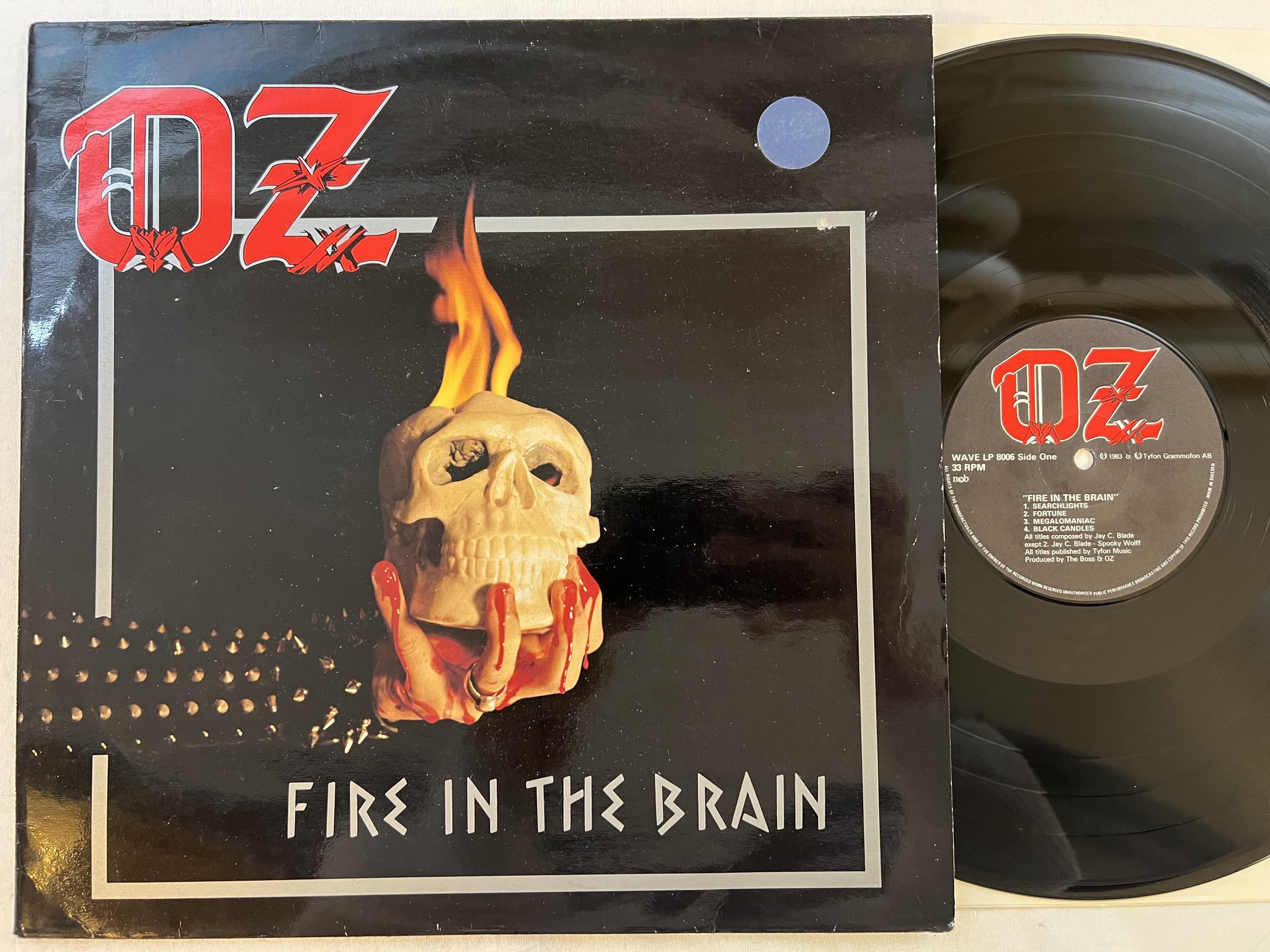 Omslagsbild för skivan OZ Fire In The Brain LP -83 Swe WAVE LP 8006 *** RARE HEAVY METAL ***
