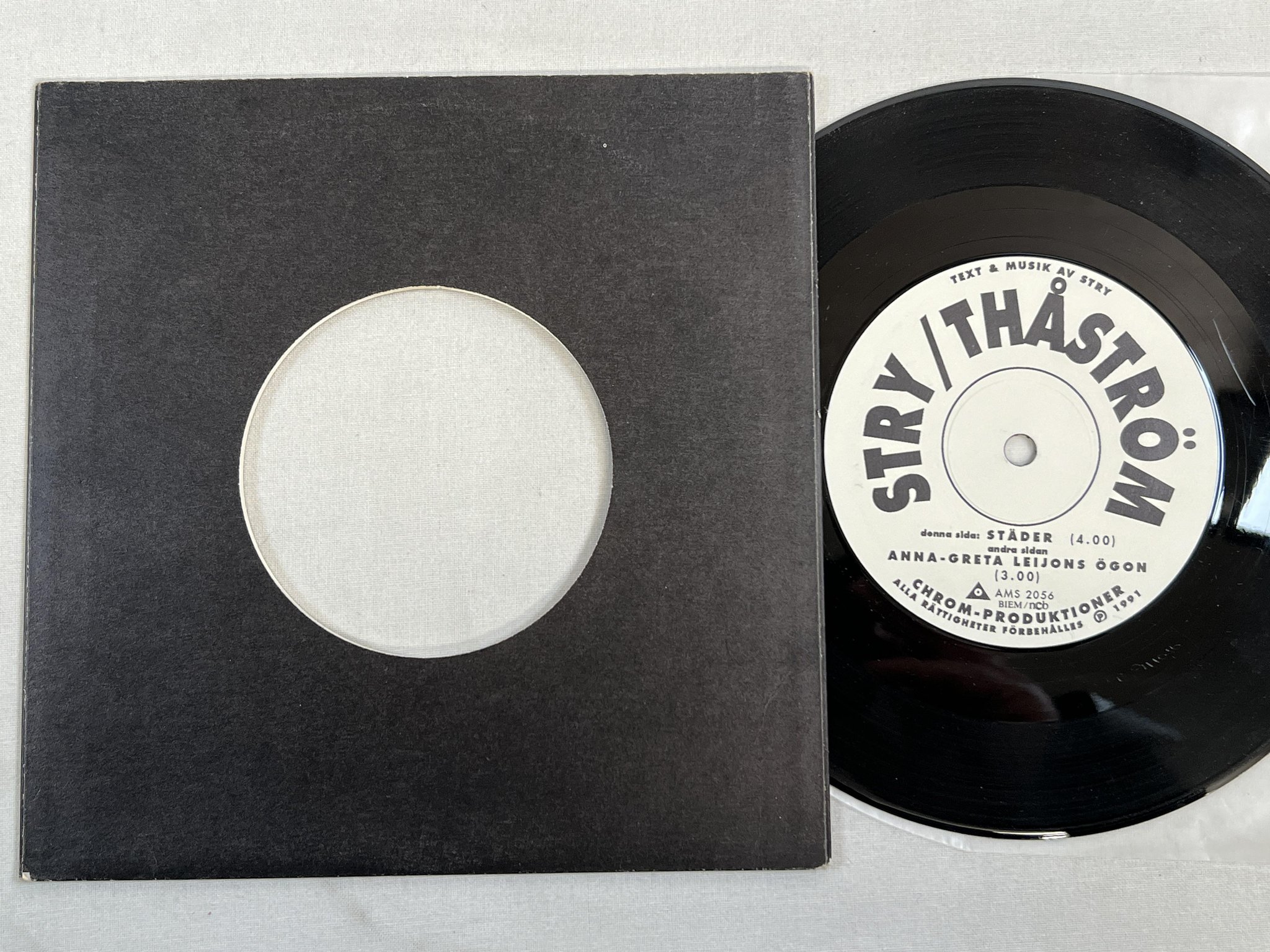 Omslagsbild för skivan STRY / THÅSTRÖM städer 7"single -91 AMALTHEA AMS 2056 ** solid centre **