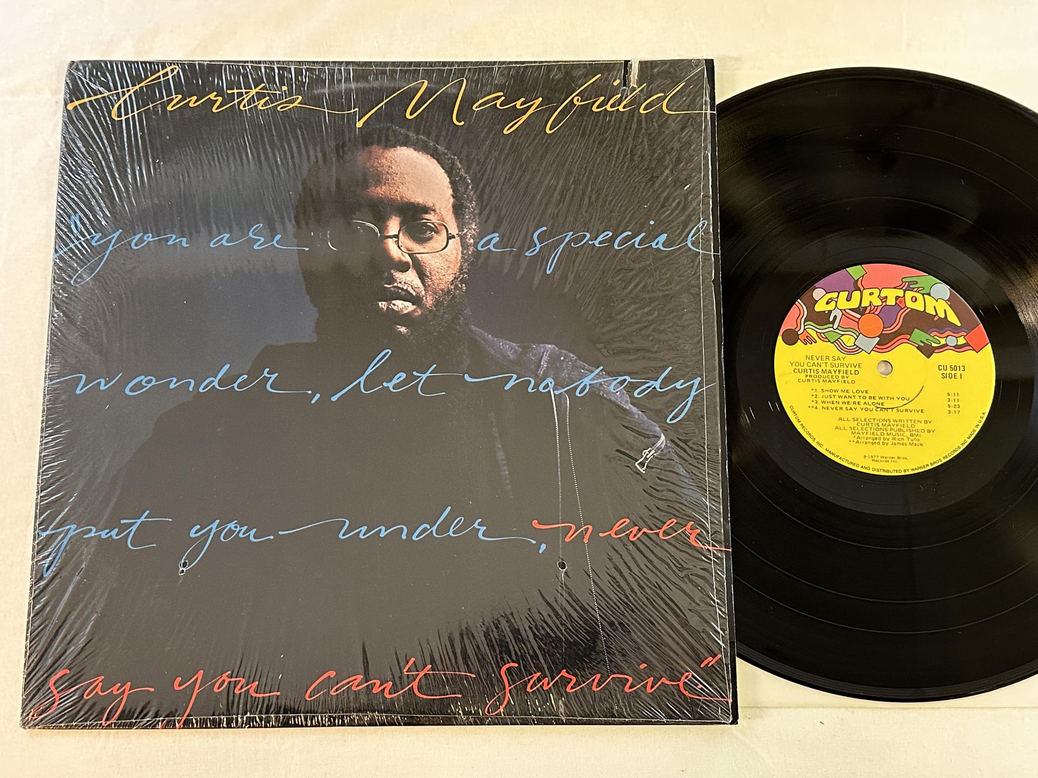 Omslagsbild för skivan CURTIS MAYFIELD never say you can't survive LP -77 US CURTOM CU 5013