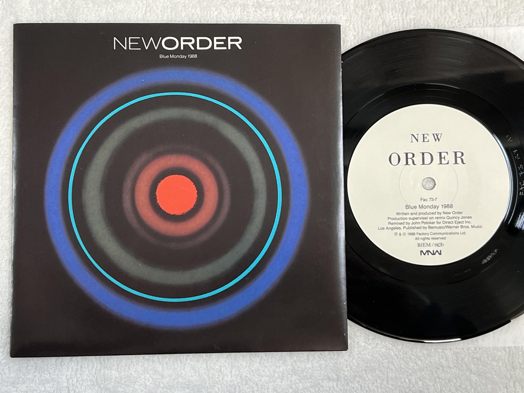 Omslagsbild för skivan NEW ORDER blue monday 7" -88 MNW FAC 73-7
