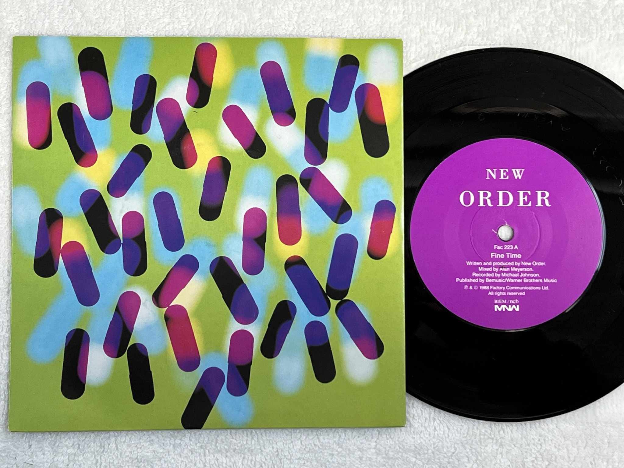 Omslagsbild för skivan NEW ORDER fine game 7" -88 MNW FAC 223