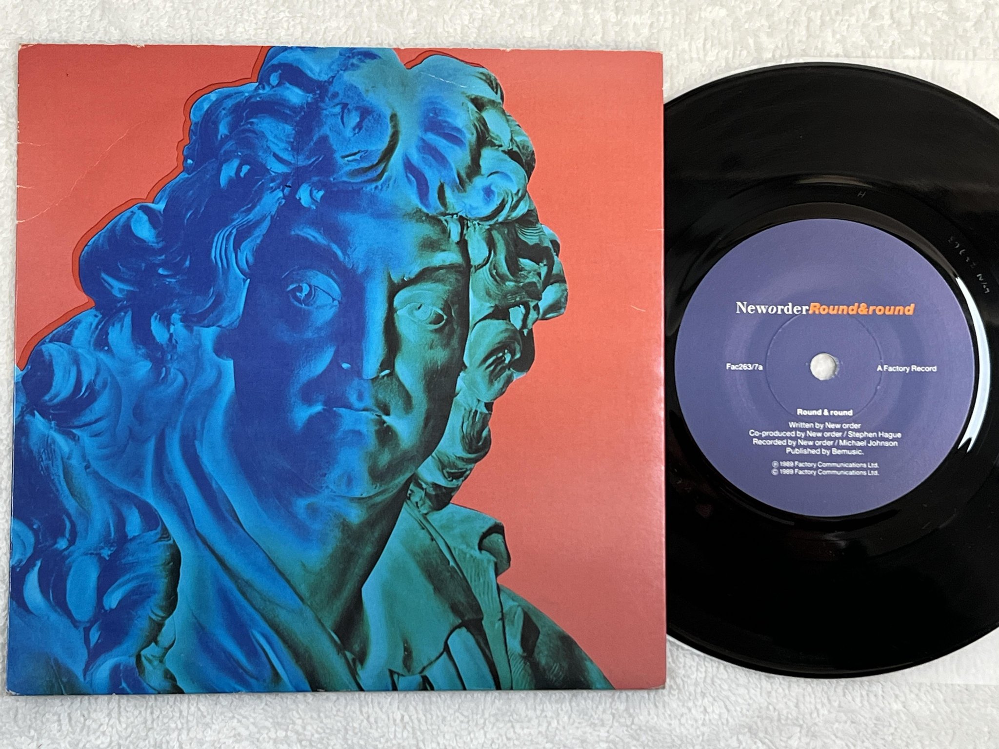 Omslagsbild för skivan NEW ORDER round and round 7" -89 FACTORY FAC 263