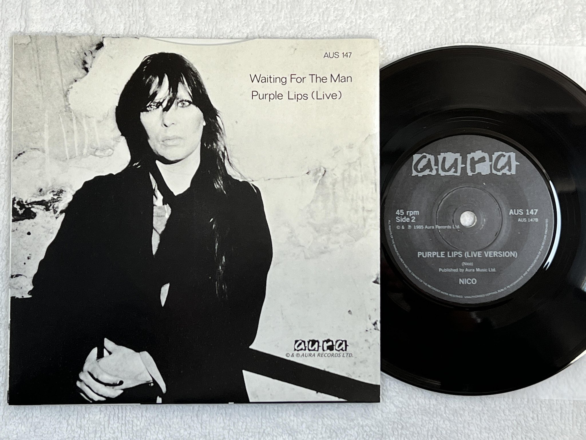 Omslagsbild för skivan NICO waiting for the man 7" -85 UK aura AUS 147 ** SNYGG SJUA **