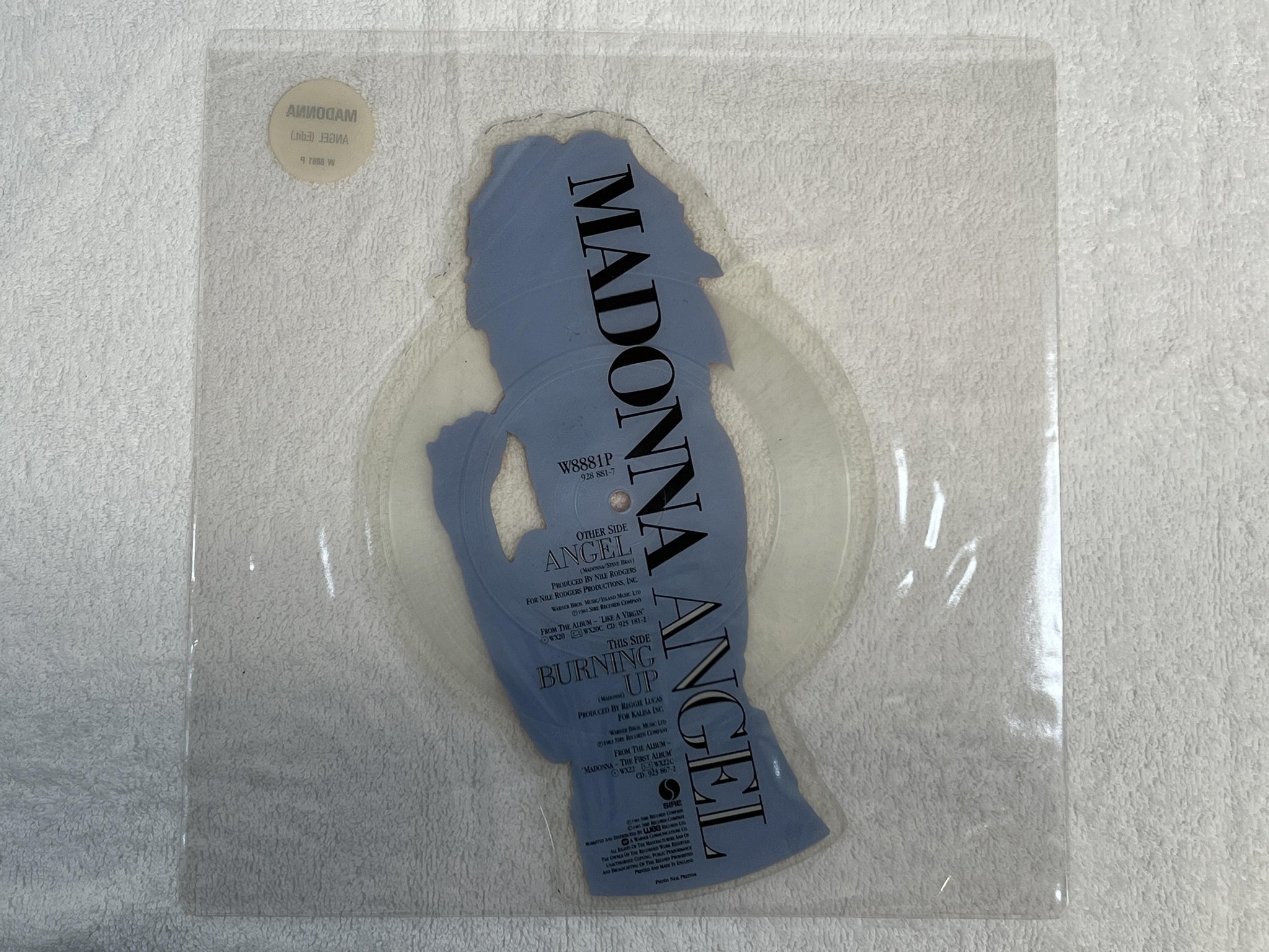 Omslagsbild för skivan MADONNA Angel 7" picture disc SIRE W 8881 P *** clear & great looking ***