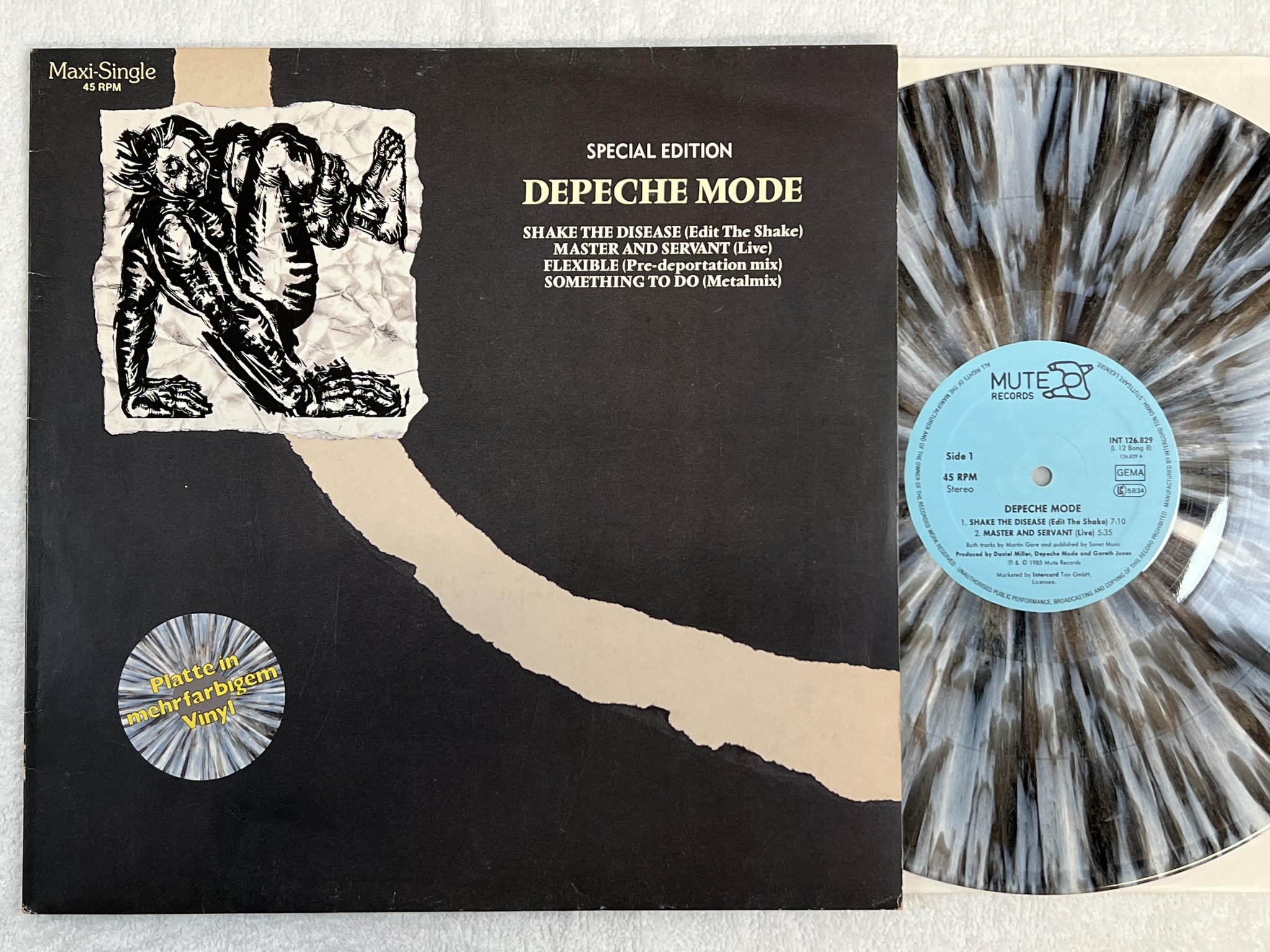 Omslagsbild för skivan DEPECHE MODE shake the disease 12"single -85 MUTE INT 126829 ** COLOUR VINYL **