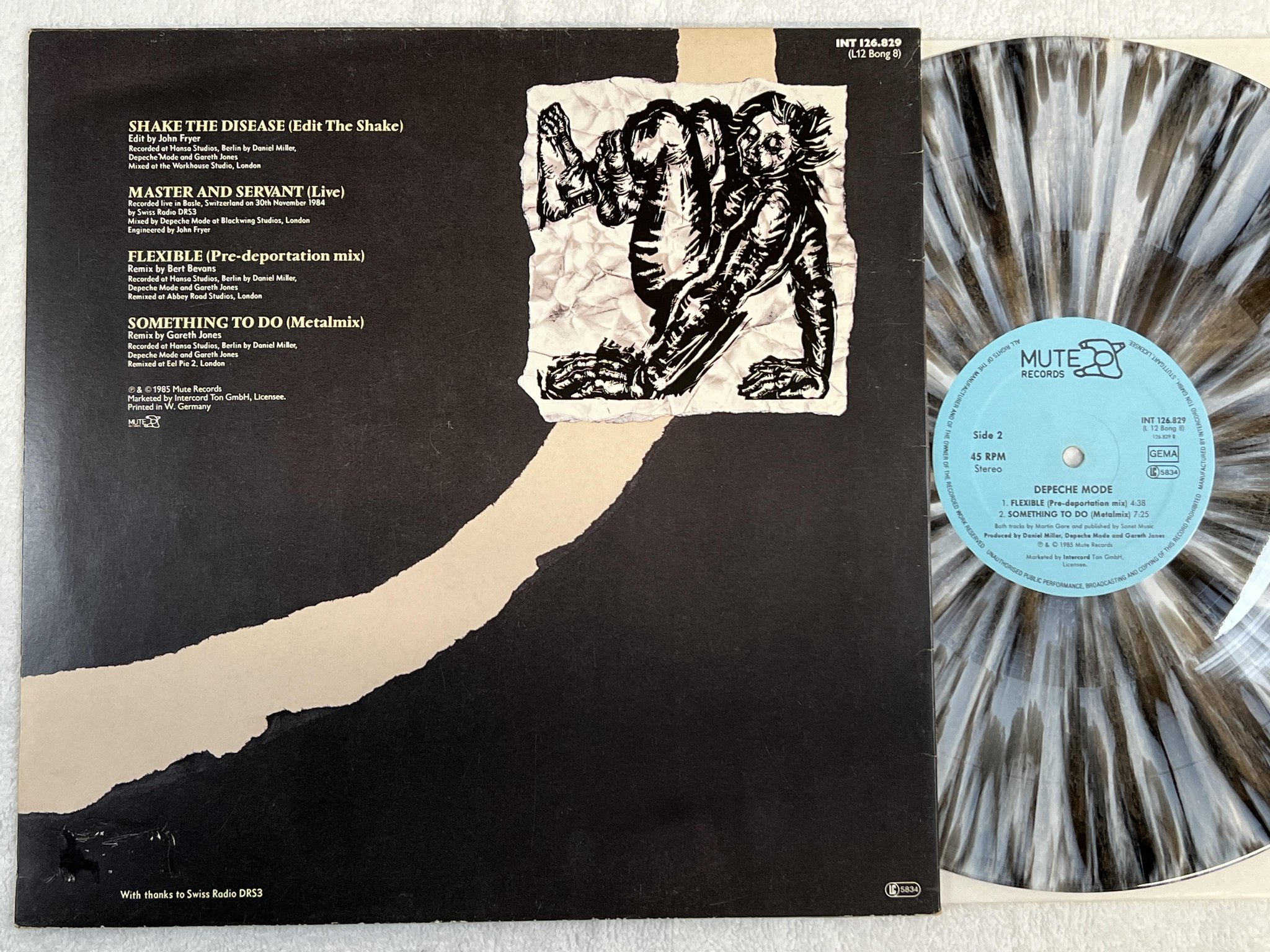 Omslagsbild för skivan DEPECHE MODE shake the disease 12"single -85 MUTE INT 126829 ** COLOUR VINYL **