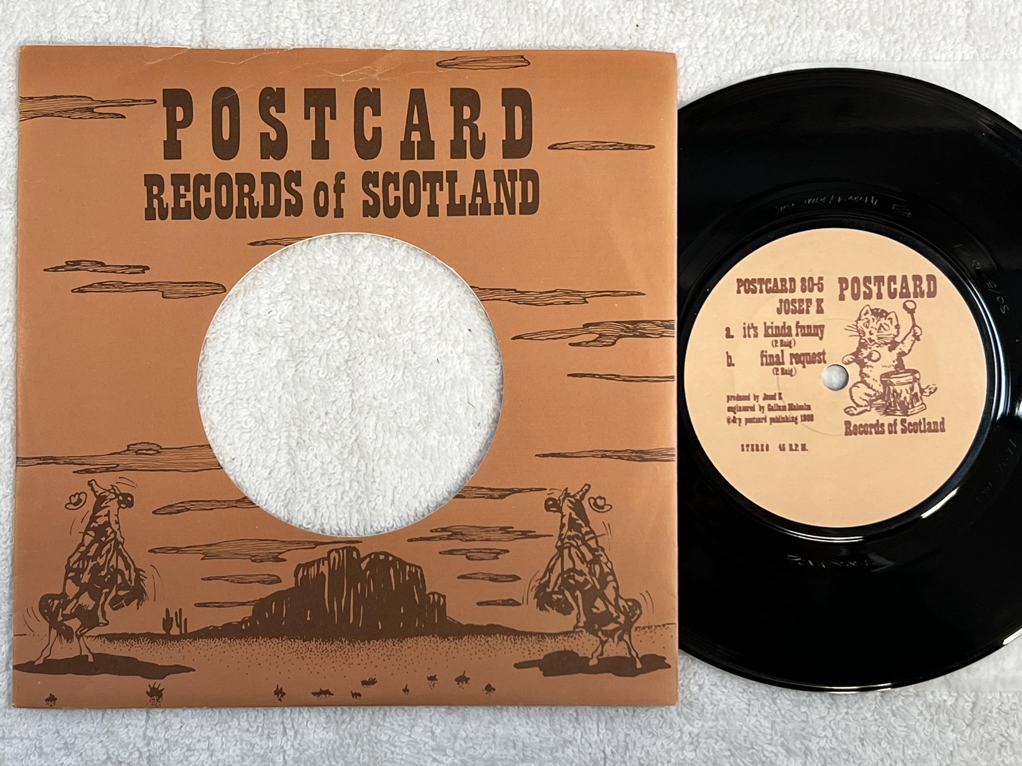 Omslagsbild för skivan JOSEF K it's kinda funny 7" -80 UK POSTCARD 80 5 *** NEW WAVE ***