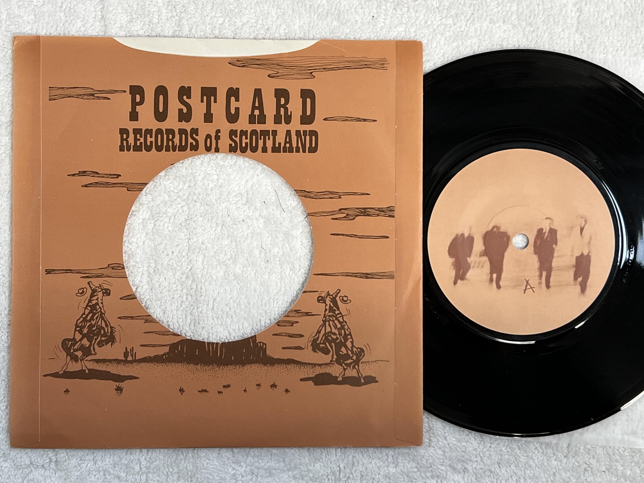 Omslagsbild för skivan JOSEF K it's kinda funny 7" -80 UK POSTCARD 80 5 *** NEW WAVE ***