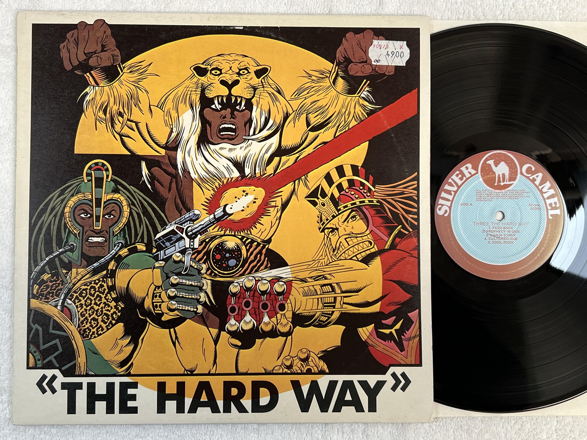 Omslagsbild för skivan V/A three the hard way LP -81 UK SILVER CAMEL SC001 ** RARE DUB REGGAE **