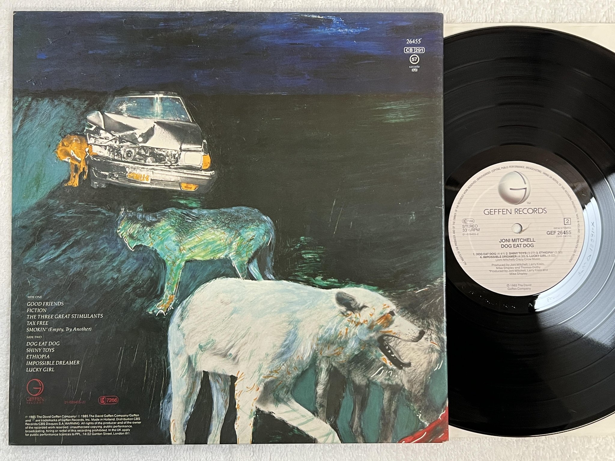 Omslagsbild för skivan JONI MITCHELL dog eat dog LP -85 Hol GEFFEN GEF 26455