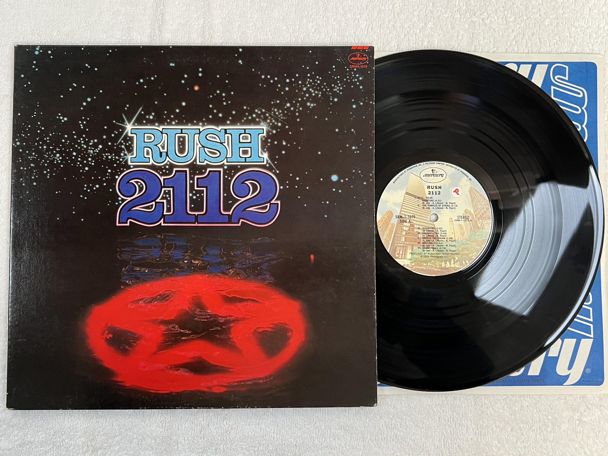 Omslagsbild för skivan RUSH 2112 LP -76 US MERCURY SRM-1-1079