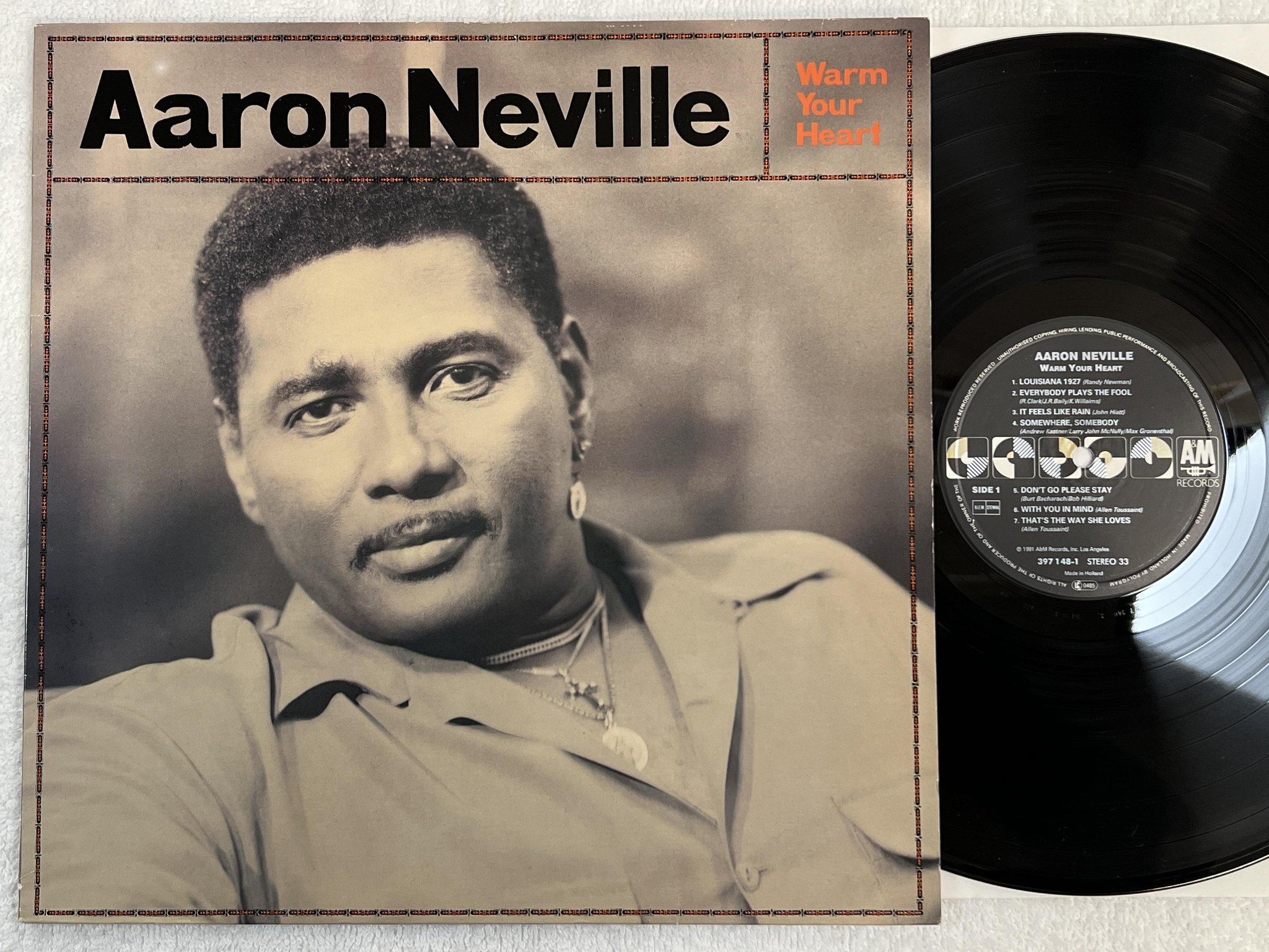 Omslagsbild för skivan AARON NEVILLE warm your heart LP -91 Hol A&M 397 148-1 *** AUDIOPHILE ***