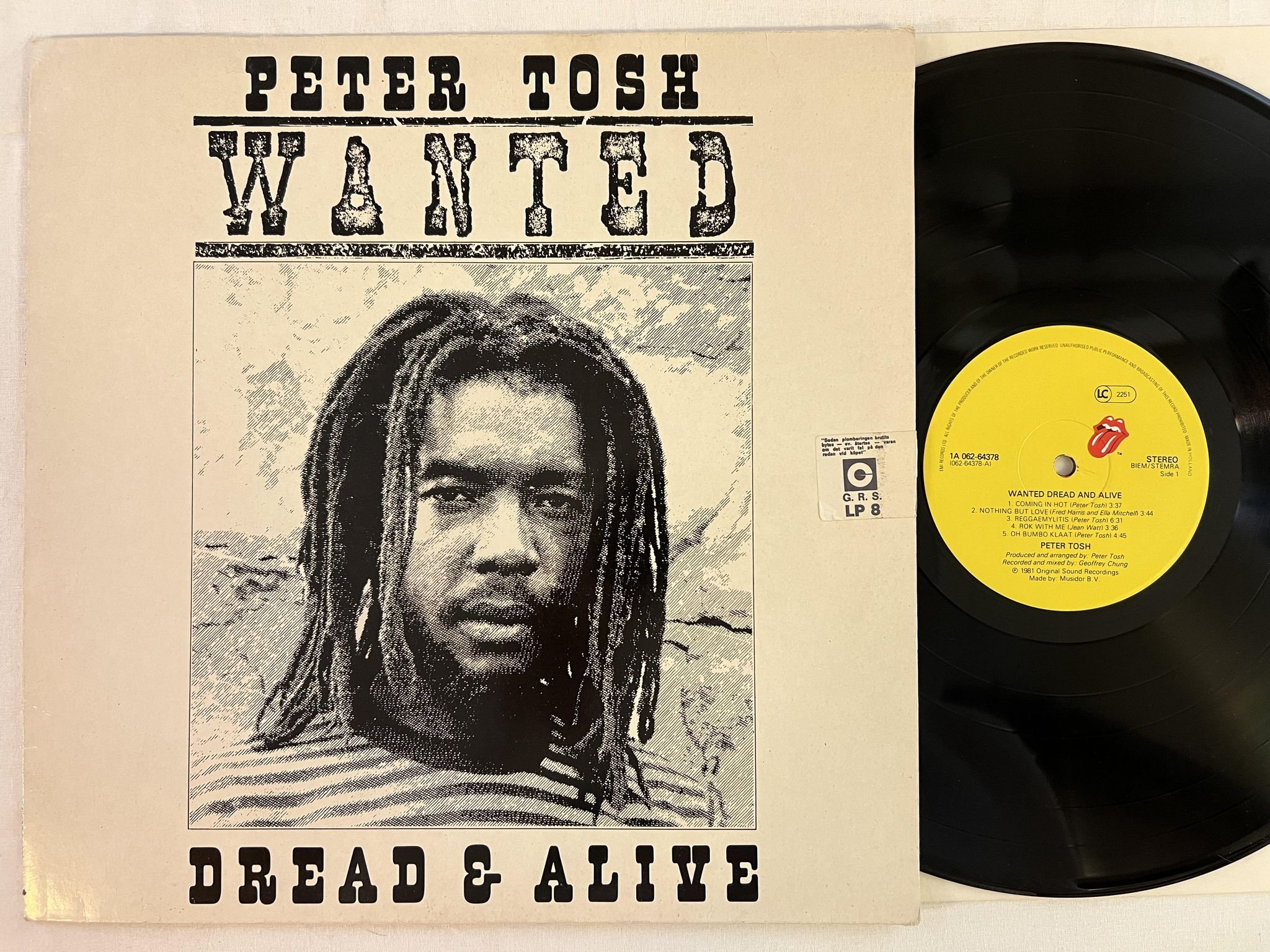 Omslagsbild för skivan PETER TOSH wanted dread and alive LP -81 ROLLING STONES 1A 062-64378