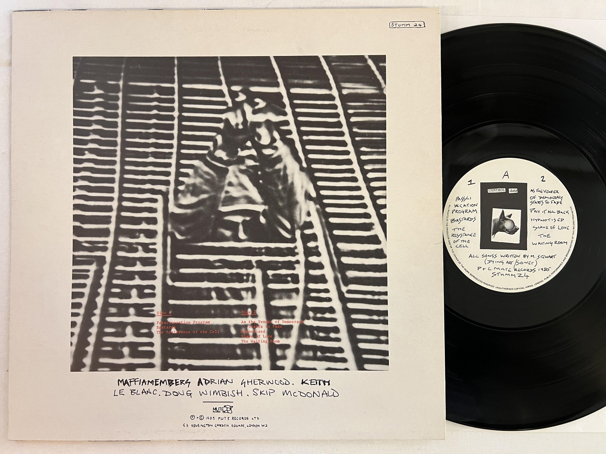 Omslagsbild för skivan MARK STEWART as the veneer of democracy starts to fade LP -85 UK STUMM 24