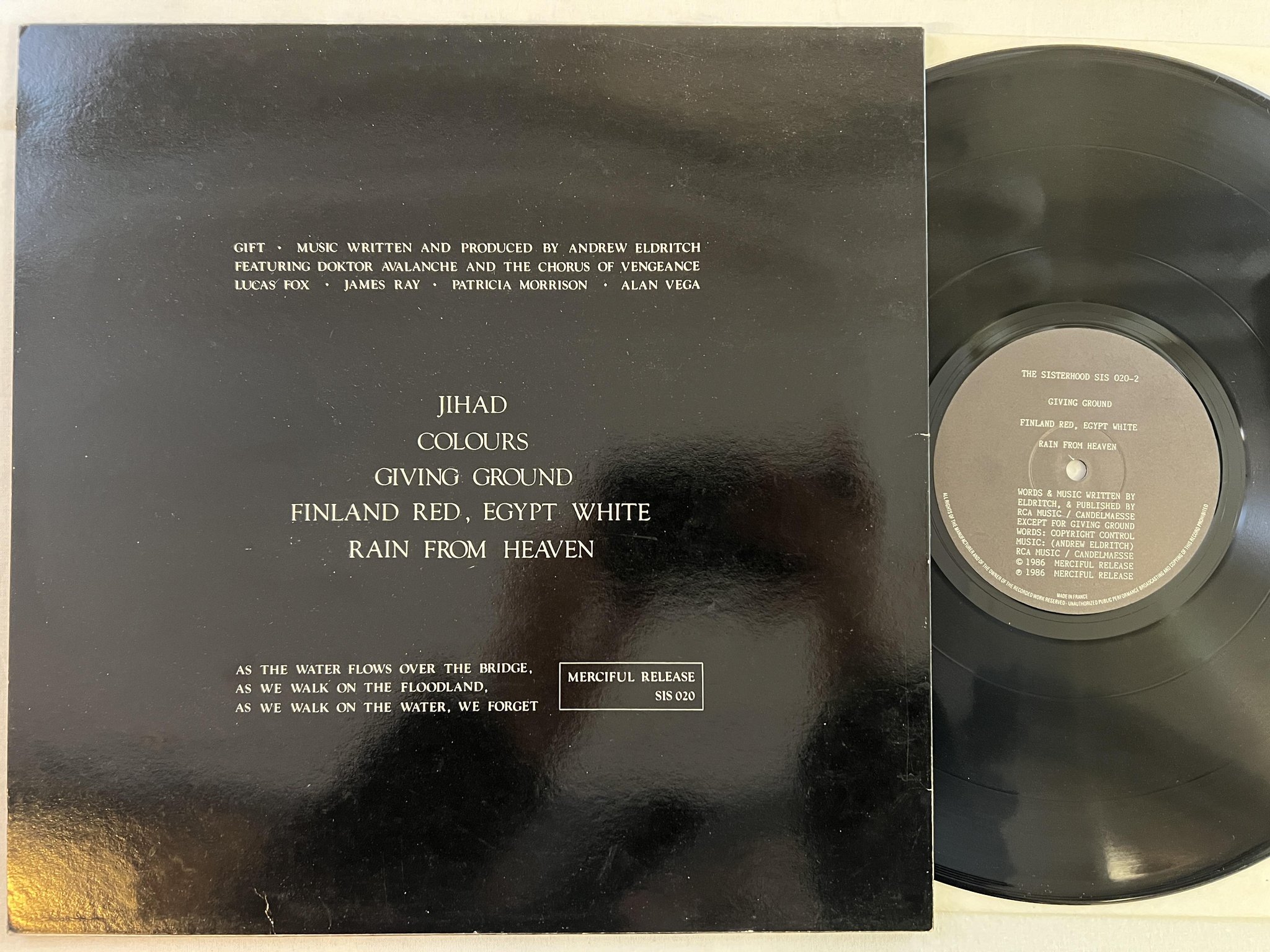 Omslagsbild för skivan THE SISTERHOOD gift LP -86 UK MERCIFUL SIS 020