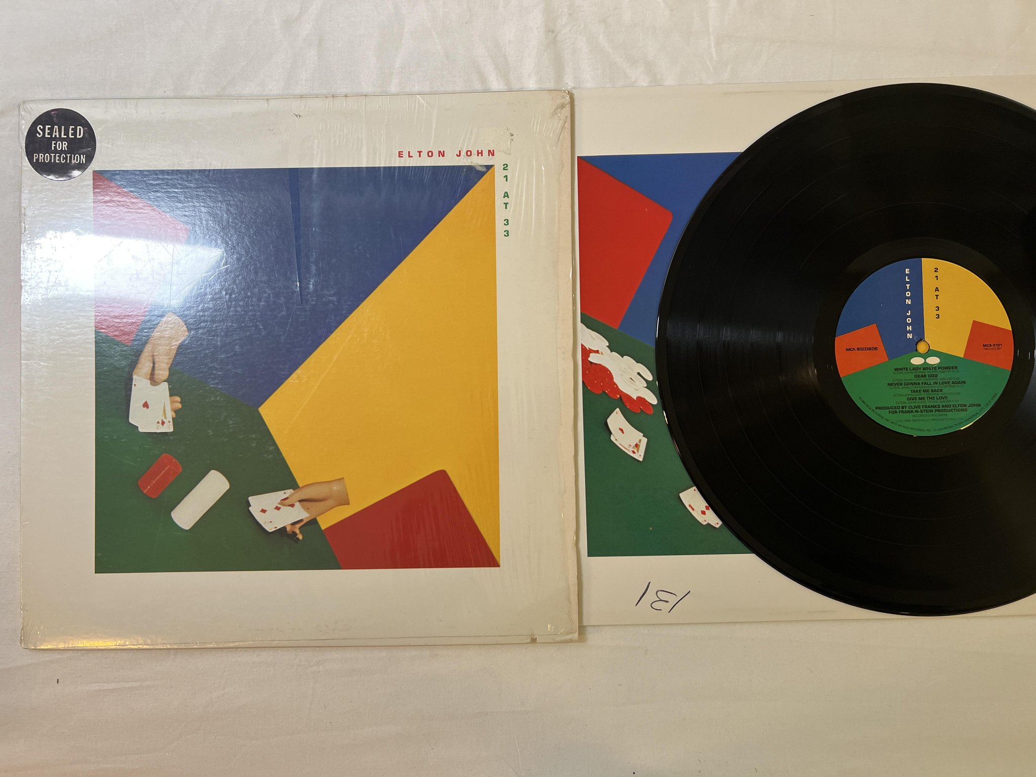 Omslagsbild för skivan ELTON JOHN 21 at 33 LP -80 US MCA 5121
