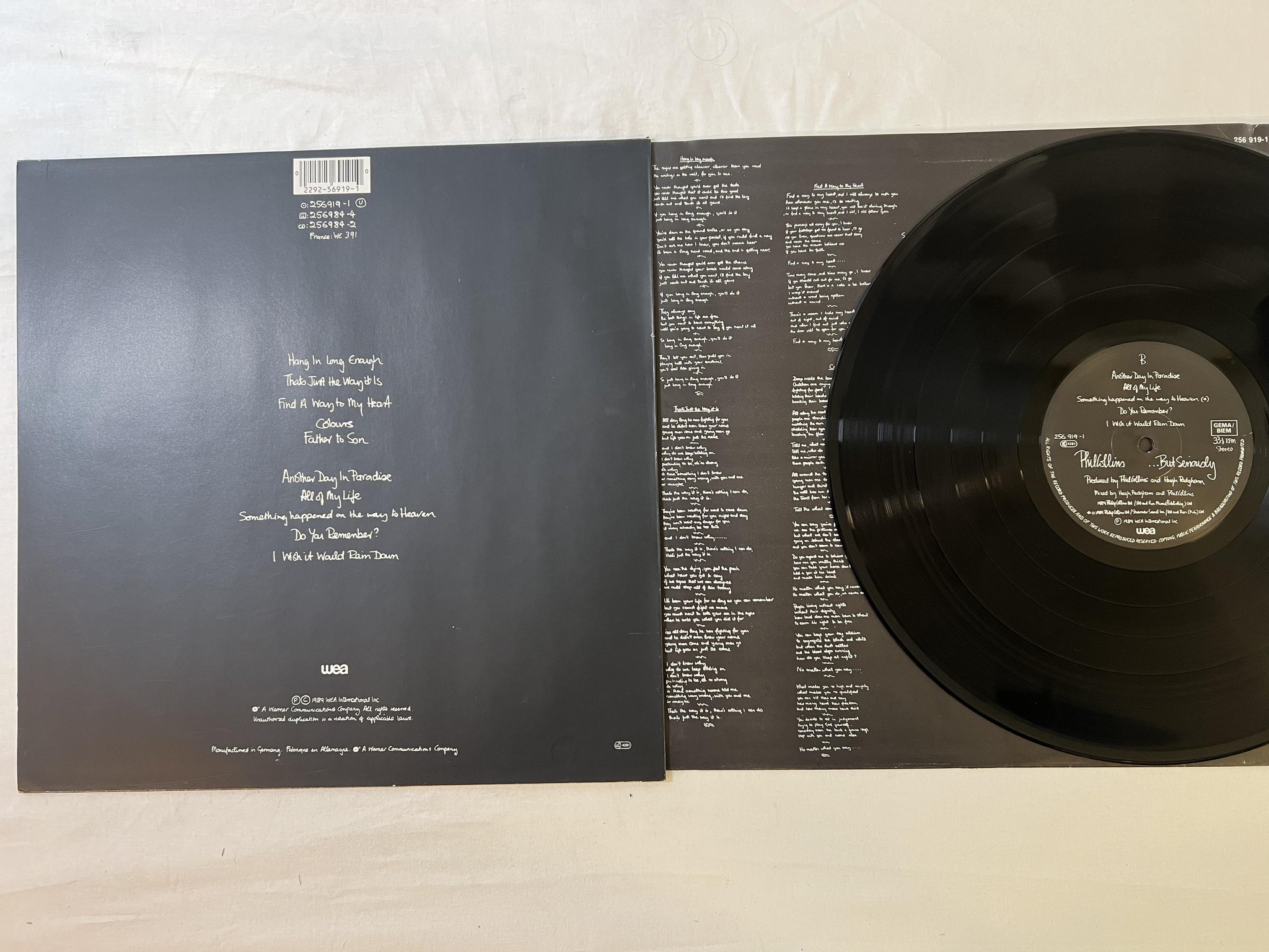 Omslagsbild för skivan PHIL COLLINS ...but seriously LP -89 WEA 256919-1 ** another day in paradise **