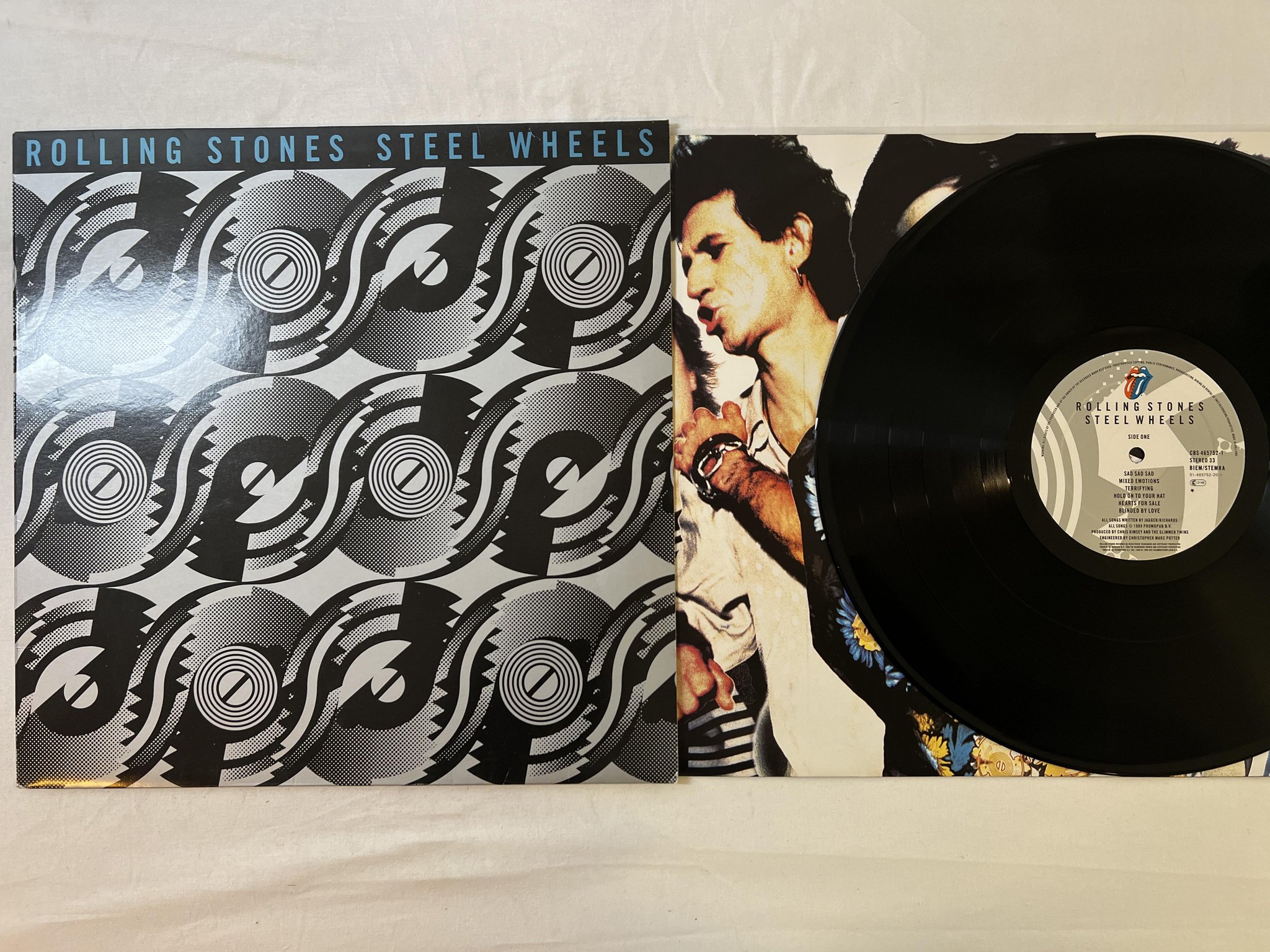 Omslagsbild för skivan THE ROLLING STONES steel wheels LP -89 Hol CBS 465752-1