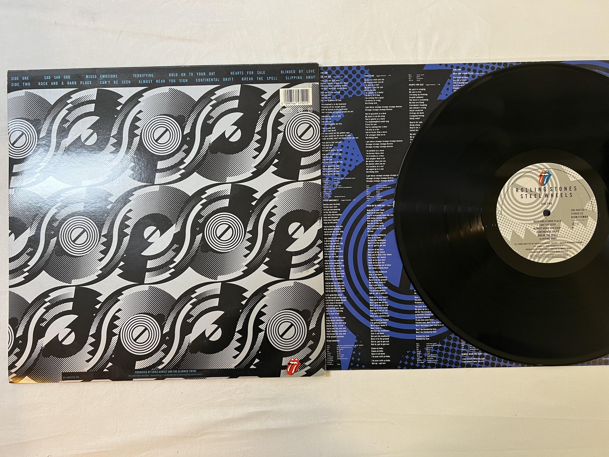 Omslagsbild för skivan THE ROLLING STONES steel wheels LP -89 Hol CBS 465752-1