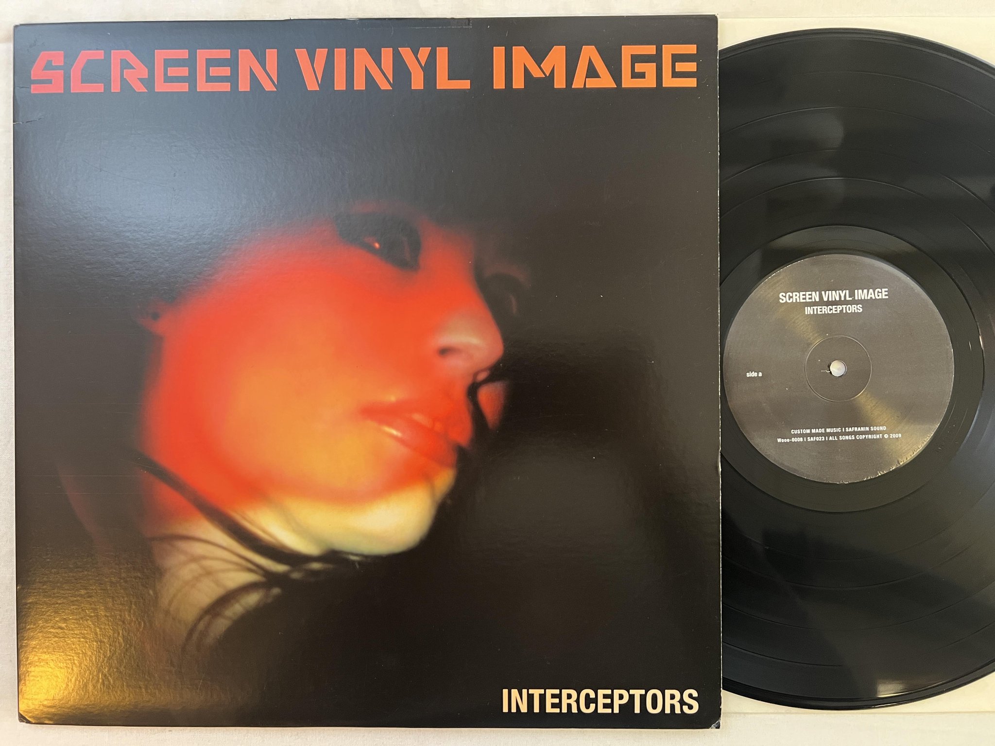 Omslagsbild för skivan SCREEN VINYL IMAGE Interceptors LP 2009 US SAFRANIN SAF023