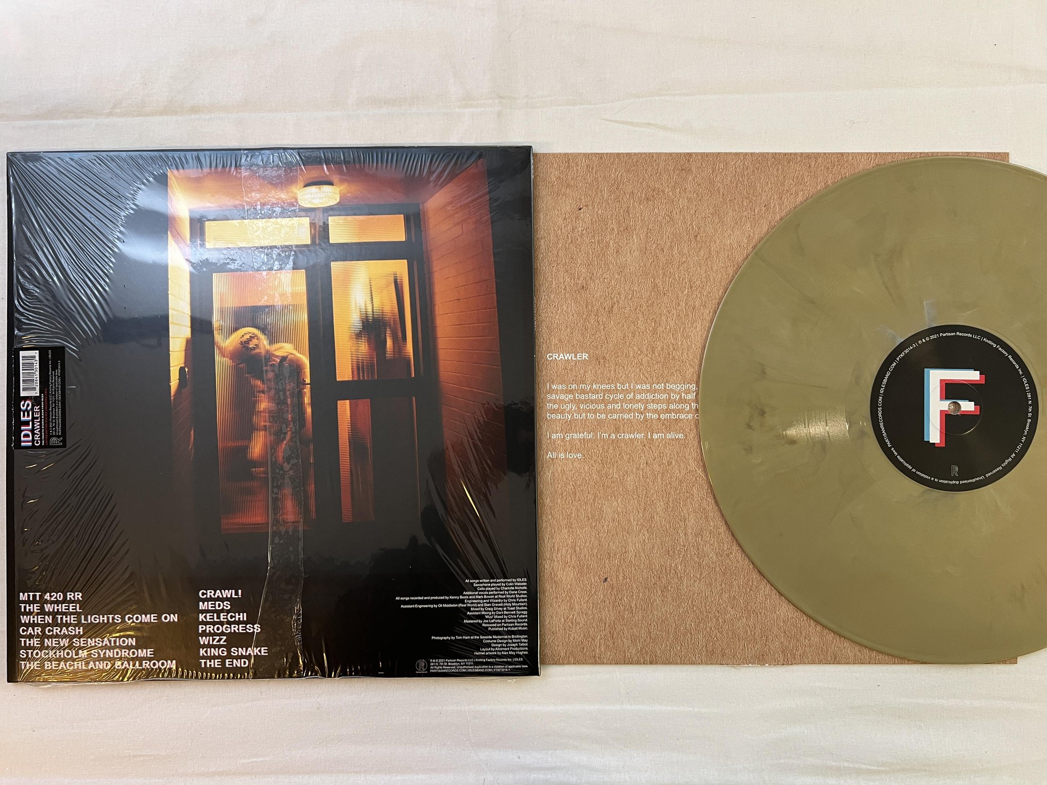 Omslagsbild för skivan IDLES crawler LP 2021 PARTISAN PTKF3014-3 *** PUNK ***