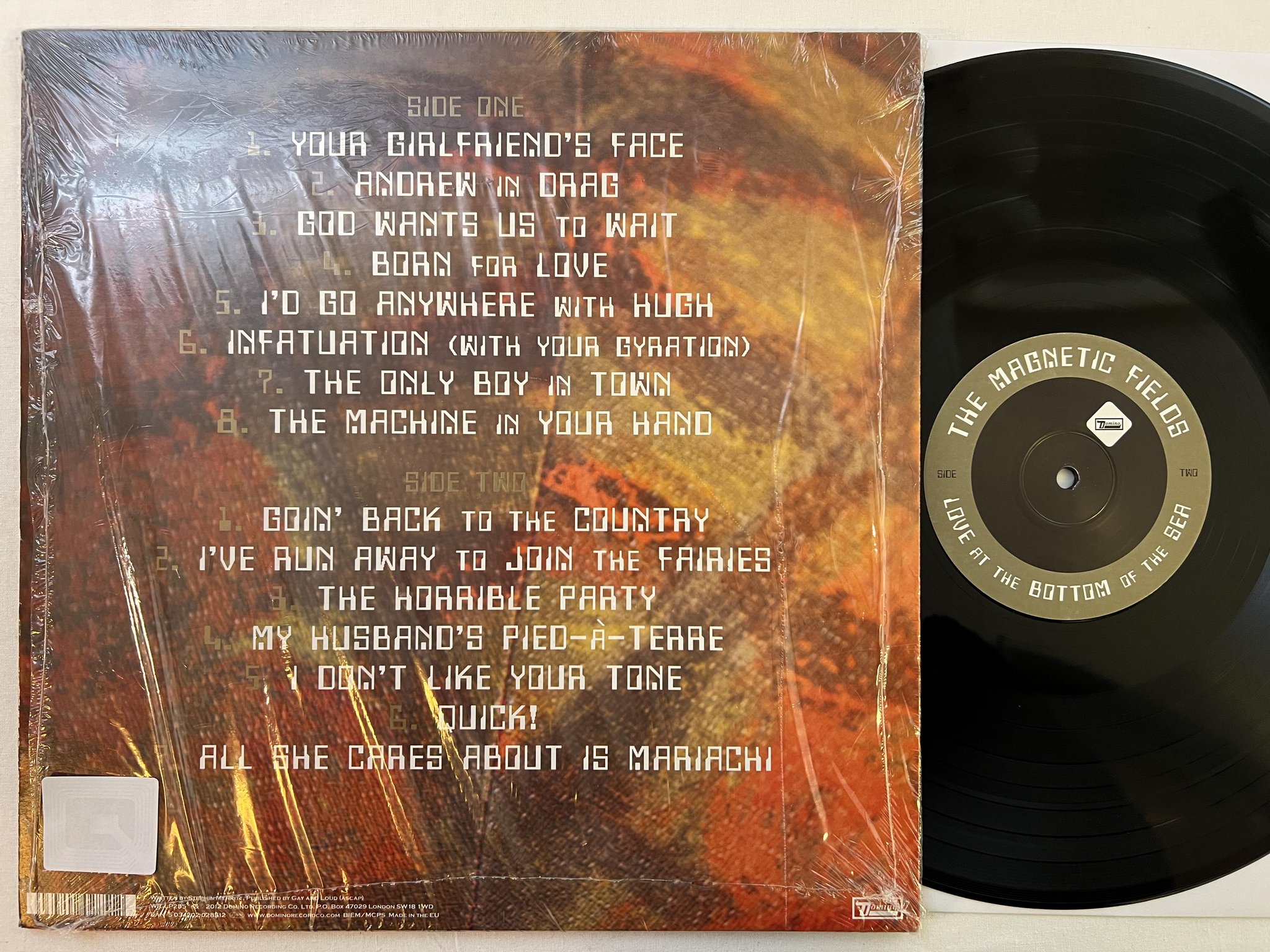 Omslagsbild för skivan THE MAGNETIC FIELDS Love At The Bottom Of The Sea LP 2012 DOMINO WIGLP285