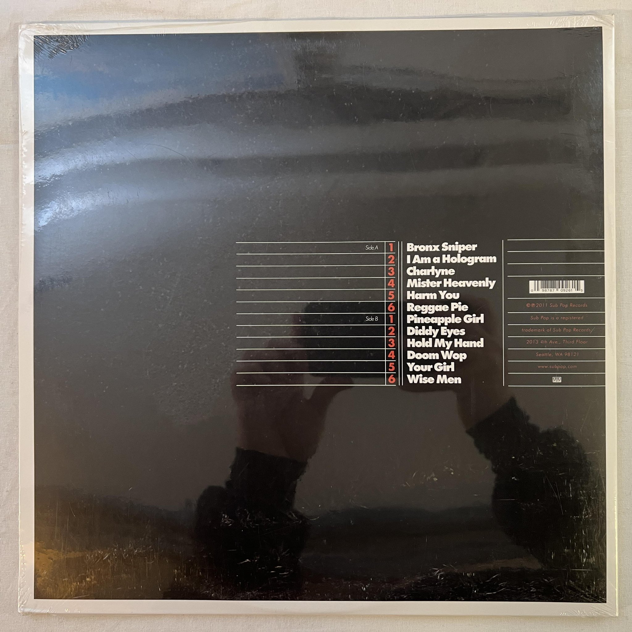 Omslagsbild för skivan MISTER HEAVENLY out of love LP 2011 US SUB POP SP 926 *** still sealed ***