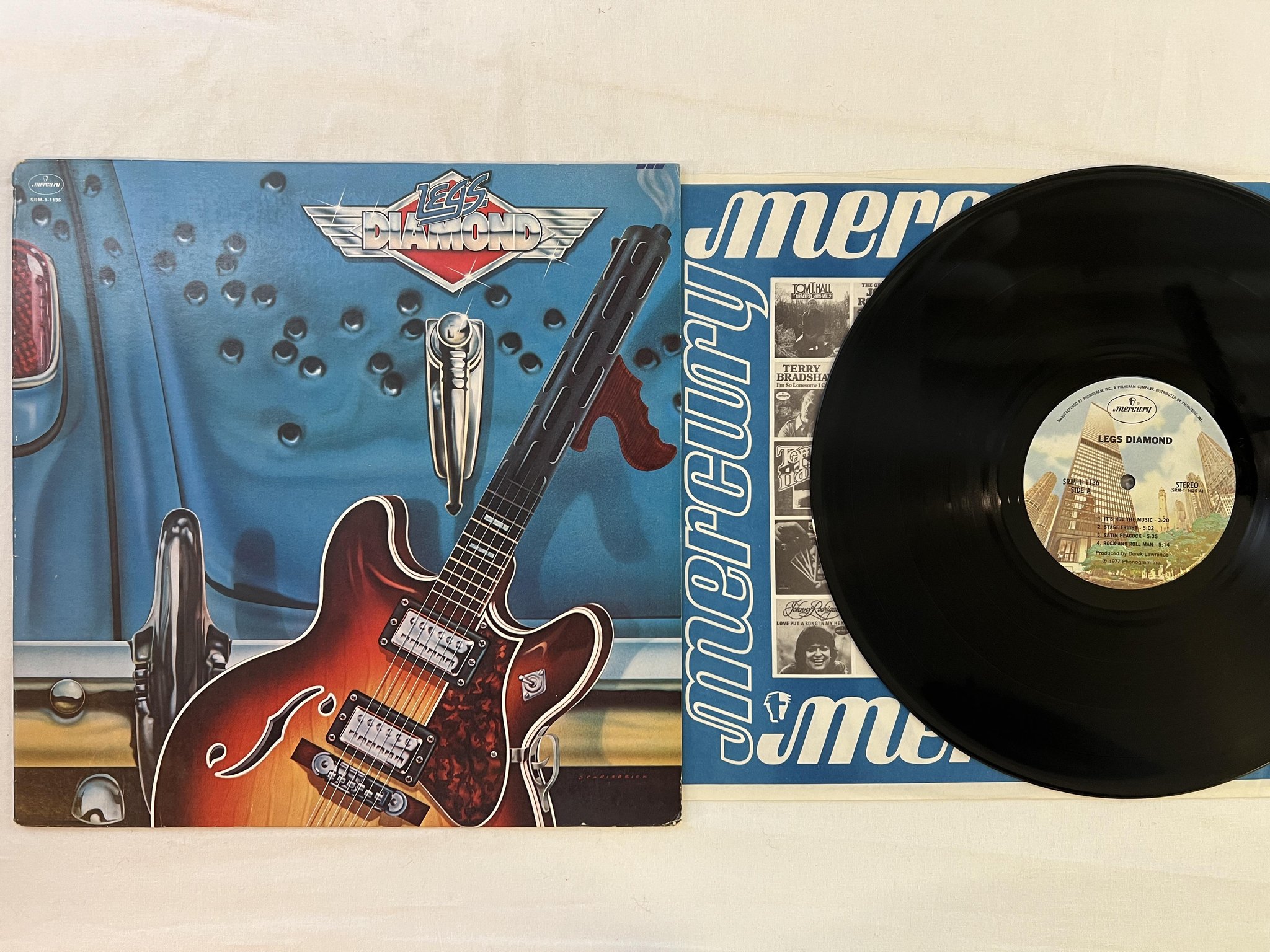 Omslagsbild för skivan LEGS DIAMOND s/T LP -77 US MERCURY SRM 1-1136