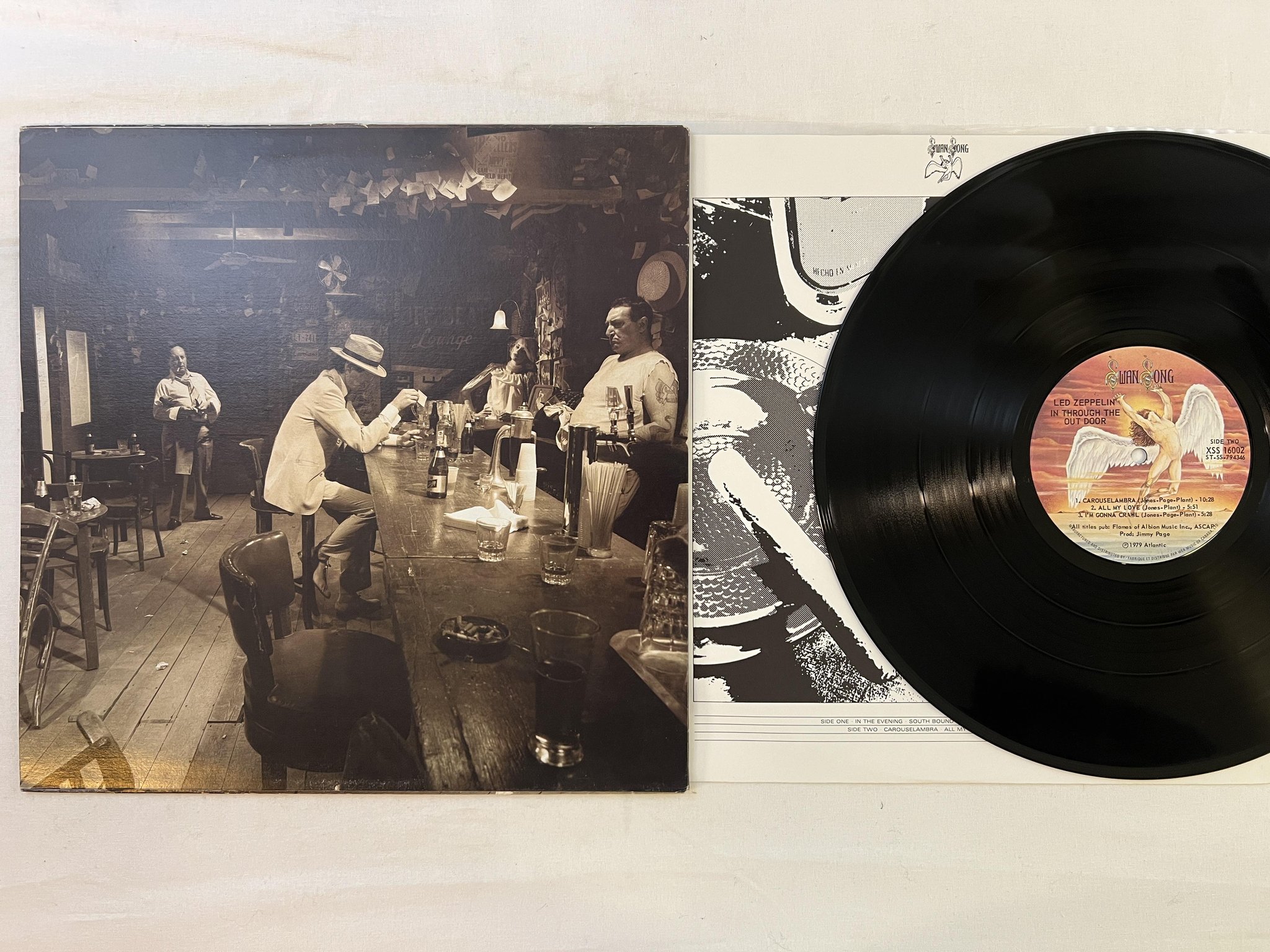 Omslagsbild för skivan LED ZEPPELIN in through the door LP -79 Can SWAN SONG XSS 16002