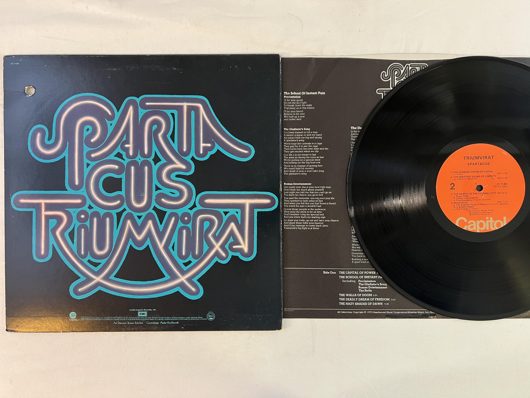 Omslagsbild för skivan TRIUMVIRAT spartacus LP -75 CAPITOL ST 11392