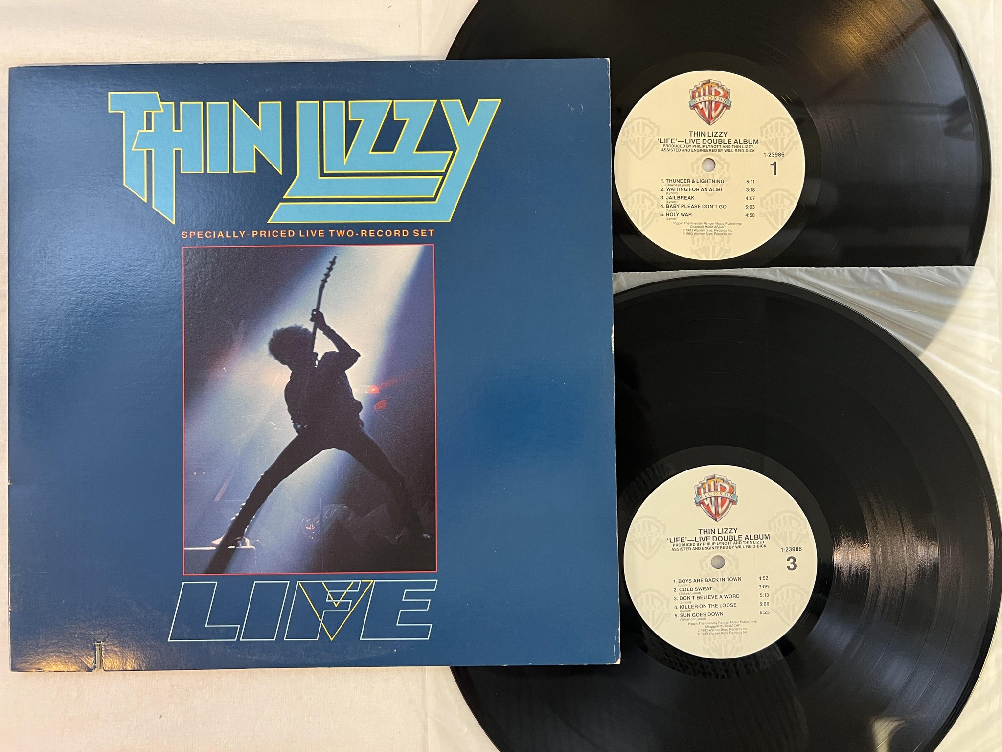 Omslagsbild för skivan THIN LIZZY life - live double album 2xLP -83 US WARNER 1-23986