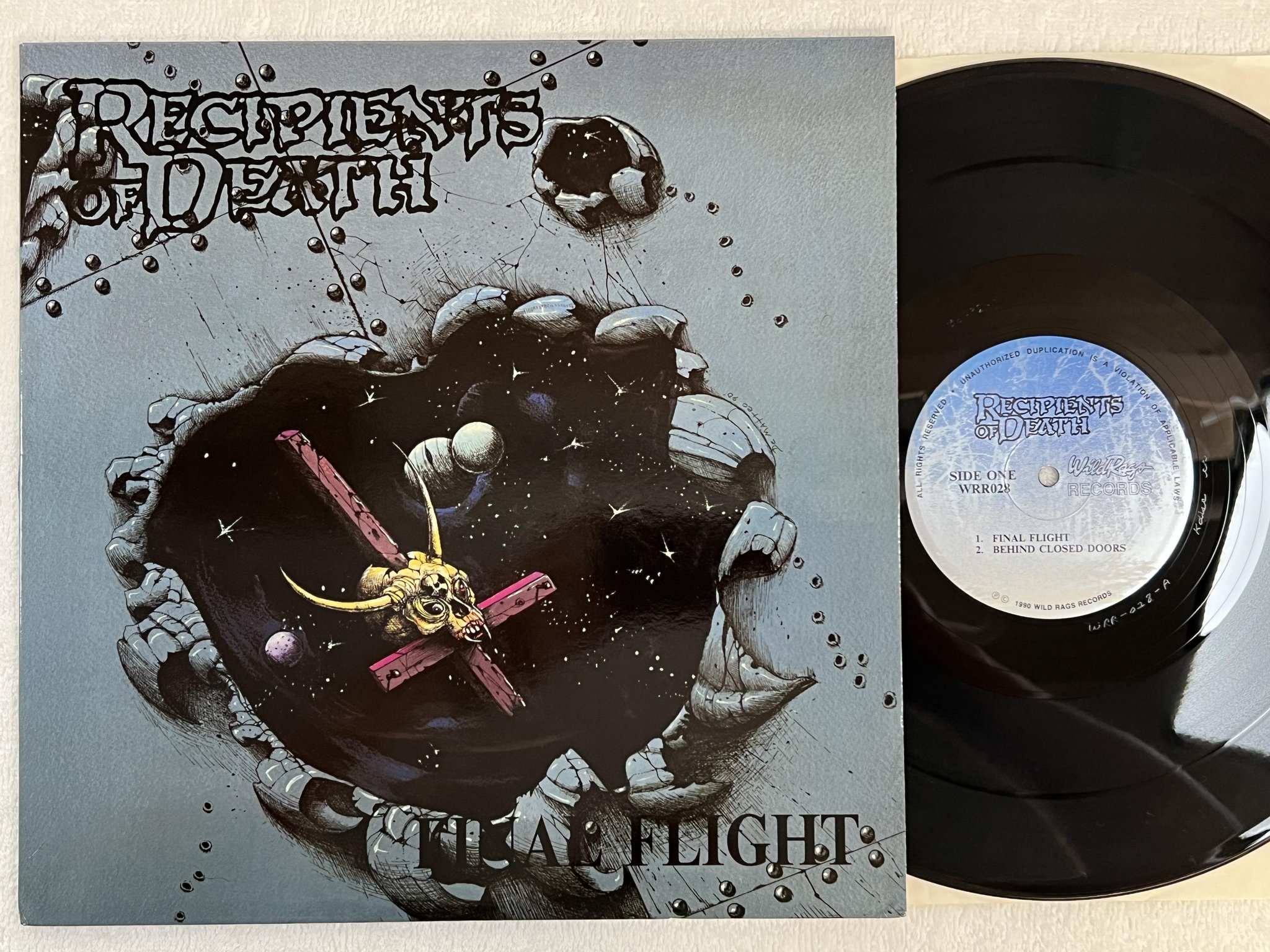 Omslagsbild för skivan RECIPIENTS OF DEATH Final Flight 12" mini-album WILD RAGS WRR028