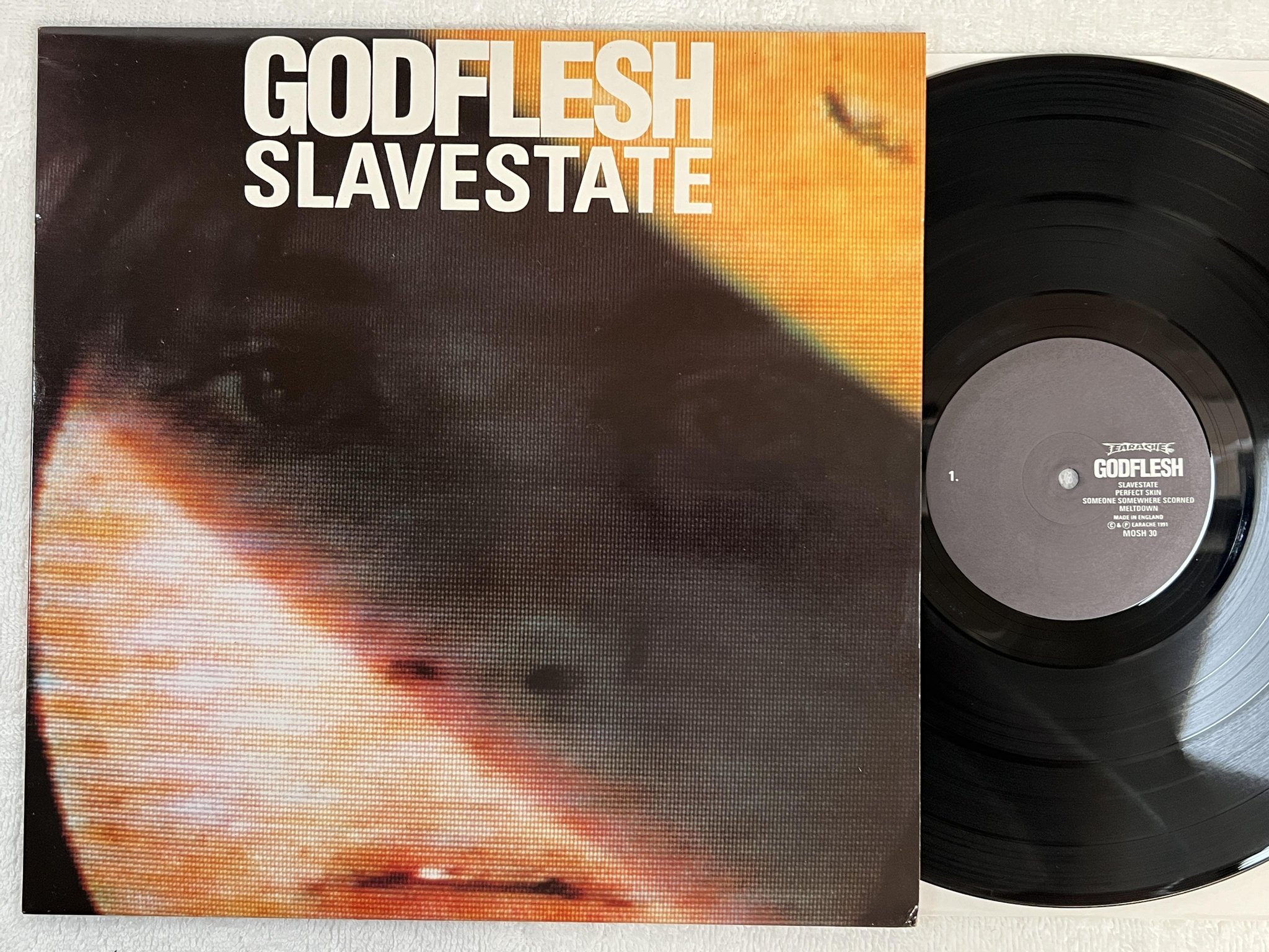 Omslagsbild för skivan GODFLESH Slavestate LP -91 UK earache MOSH 30
