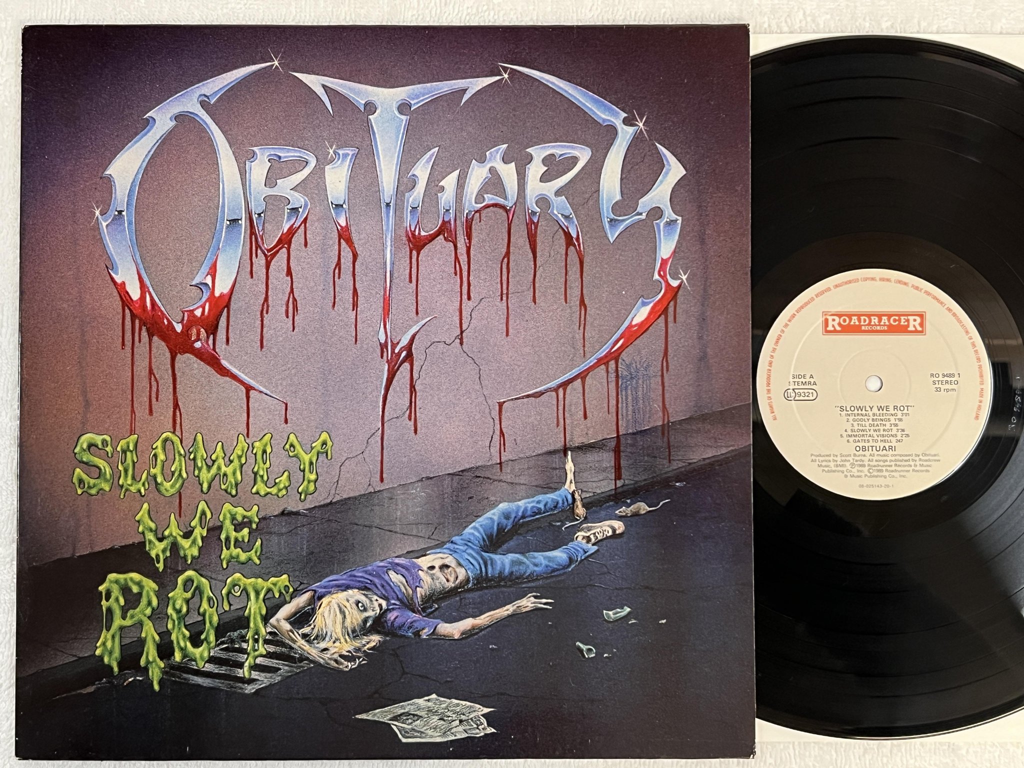 Omslagsbild för skivan OBITUARY Slowly We Rot LP -89 Hol ROADRACER RO 9489-1 ** death metal **