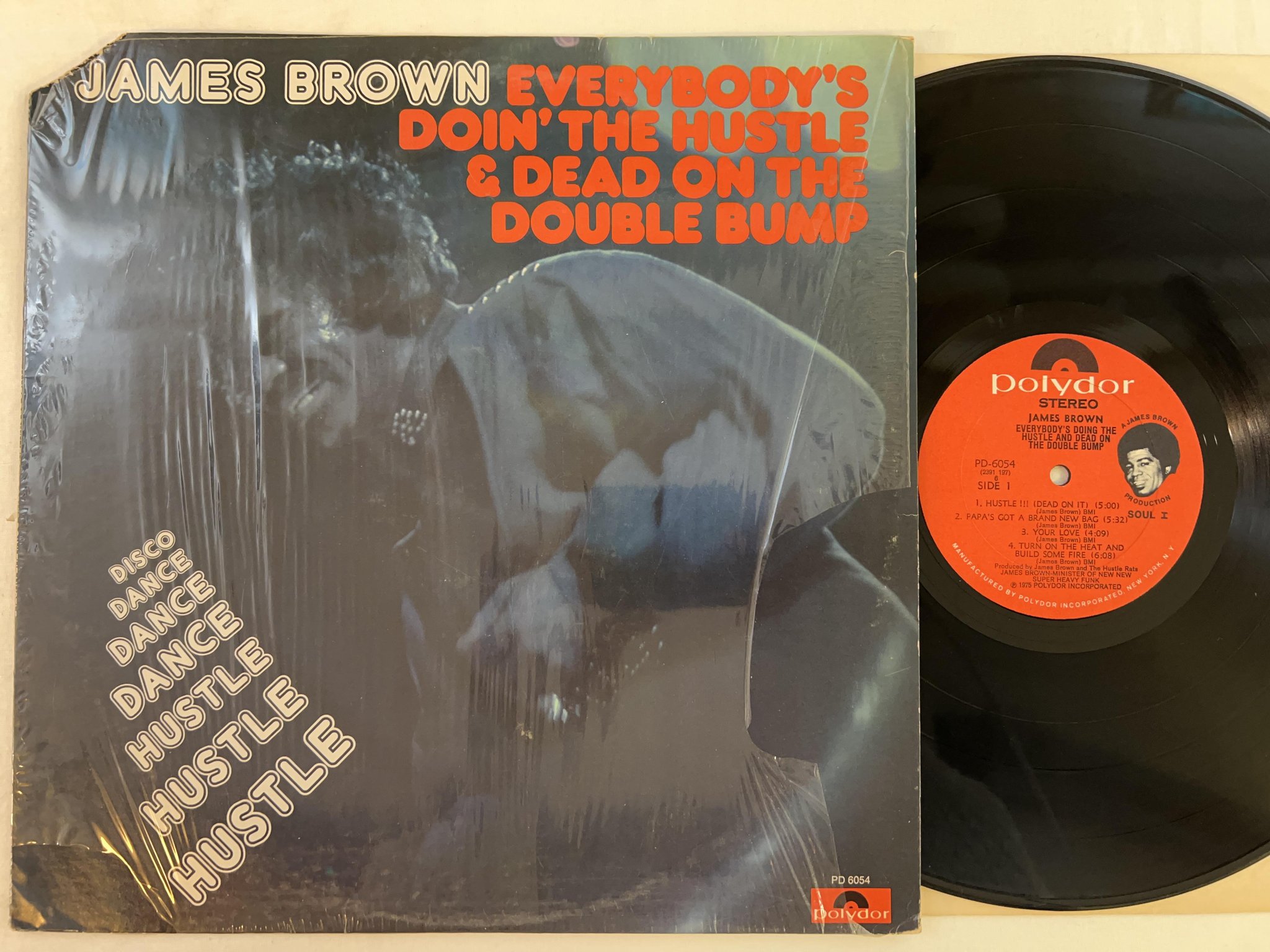 Omslagsbild för skivan JAMES BROWN everybody's doing the hustle LP -75 US POLYDOR PD 6054