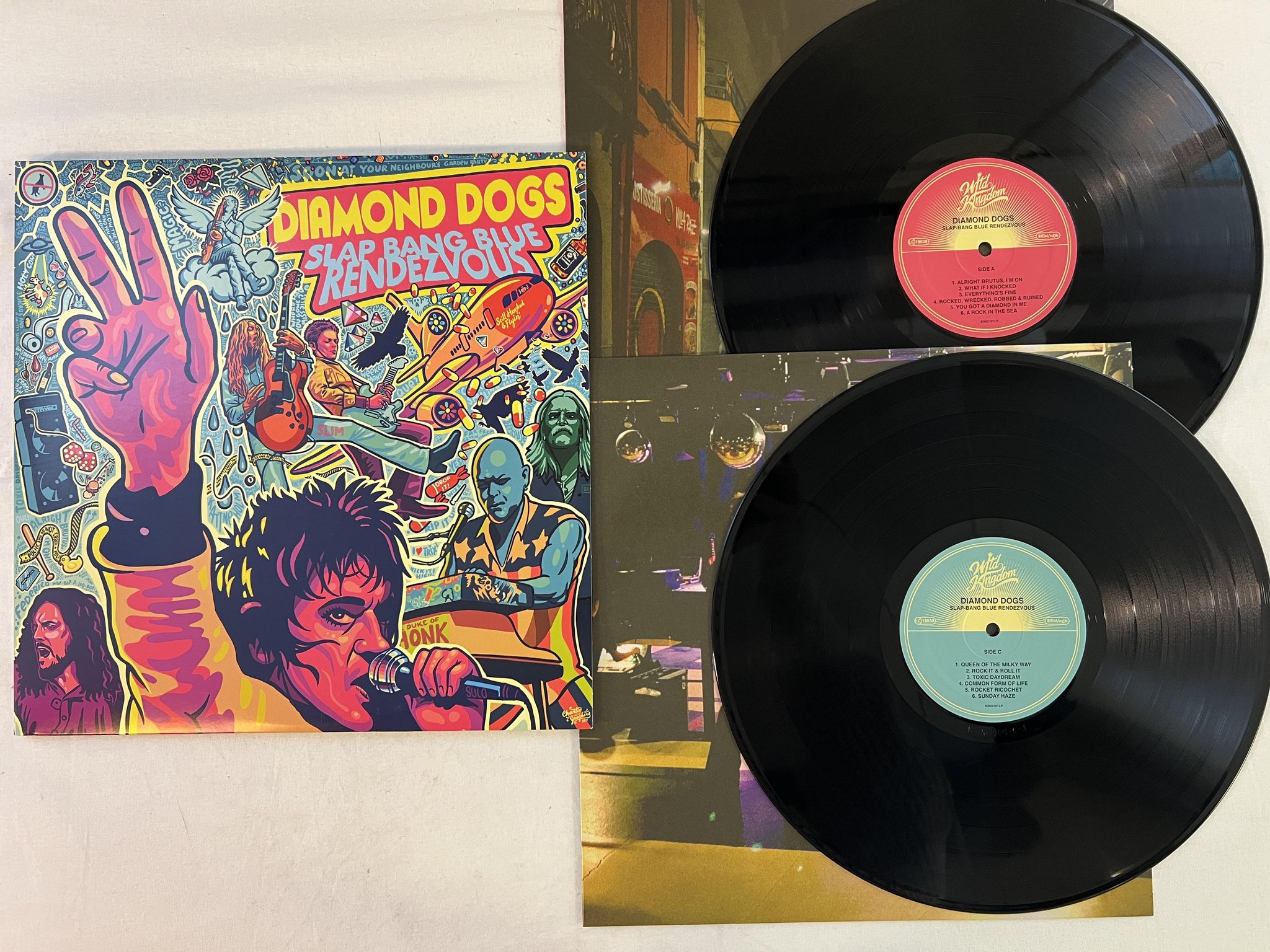 Omslagsbild för skivan DIAMOND DOGS slap bang blue rendezvous 2xLP 2022 Swe WILD KINGDOM KING101LP