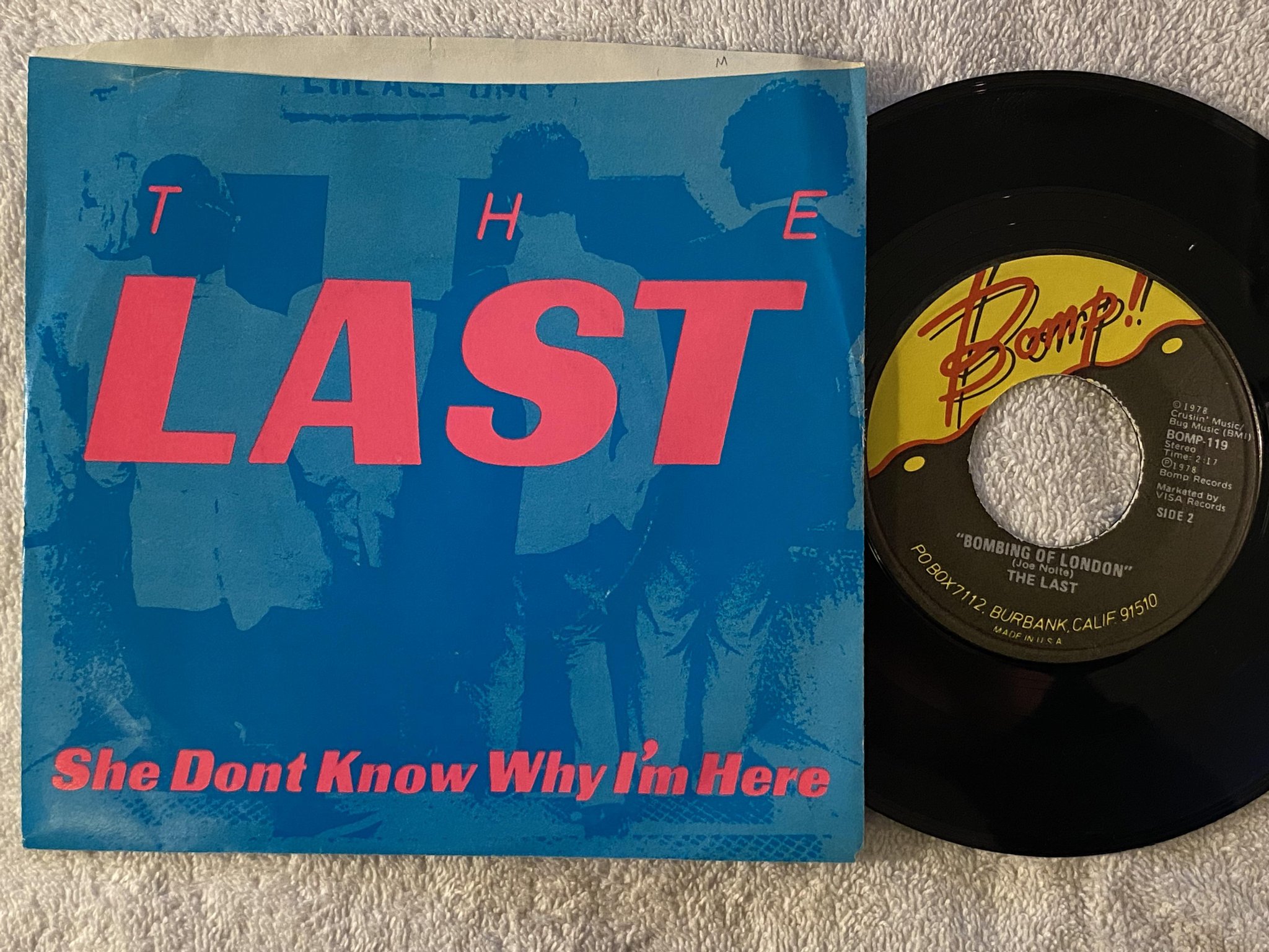 Omslagsbild för skivan THE LAST She Don't Know Why I'm Here 7" -78 US BOMP! BOMP 119