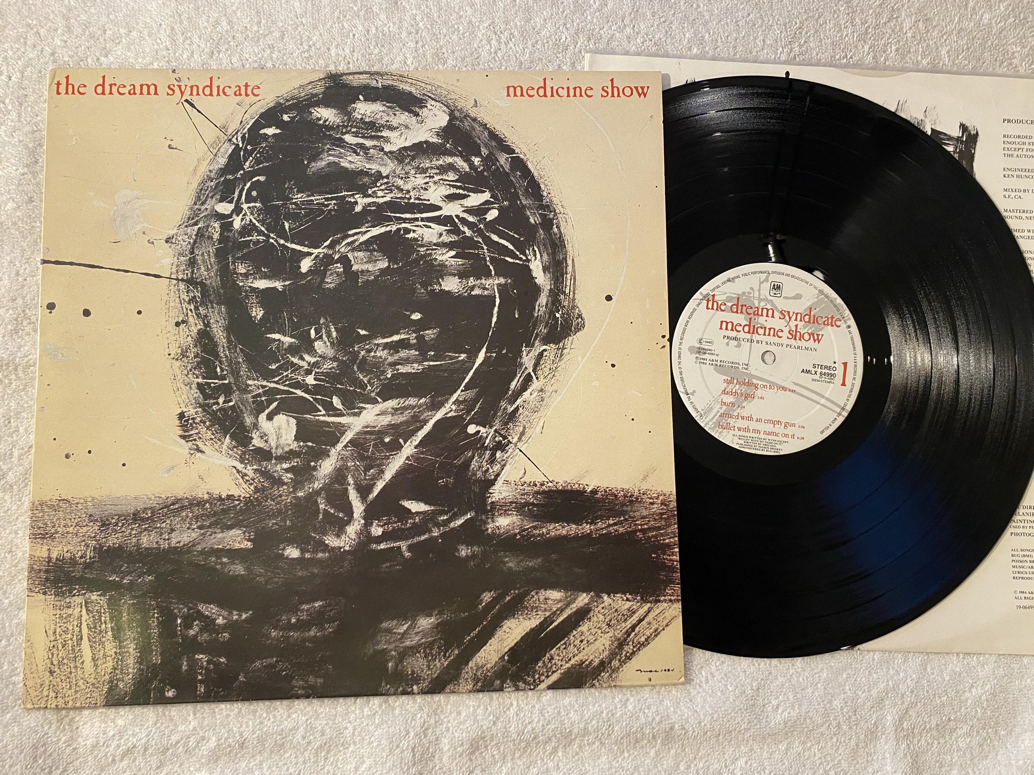 Omslagsbild för skivan THE DREAM SYNDICATE medicine show LP -84 Hol A&M AMLX 64990
