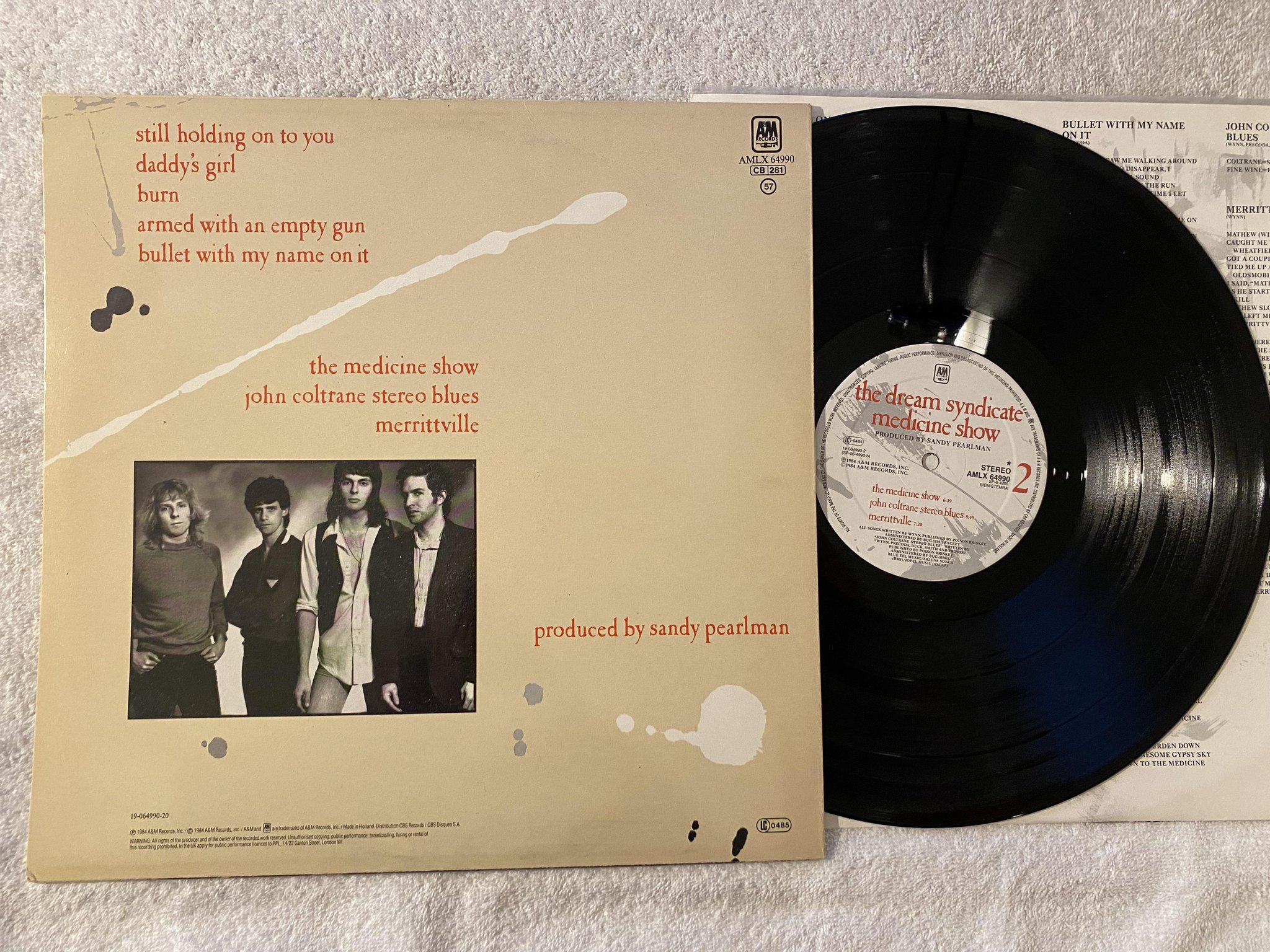 Omslagsbild för skivan THE DREAM SYNDICATE medicine show LP -84 Hol A&M AMLX 64990