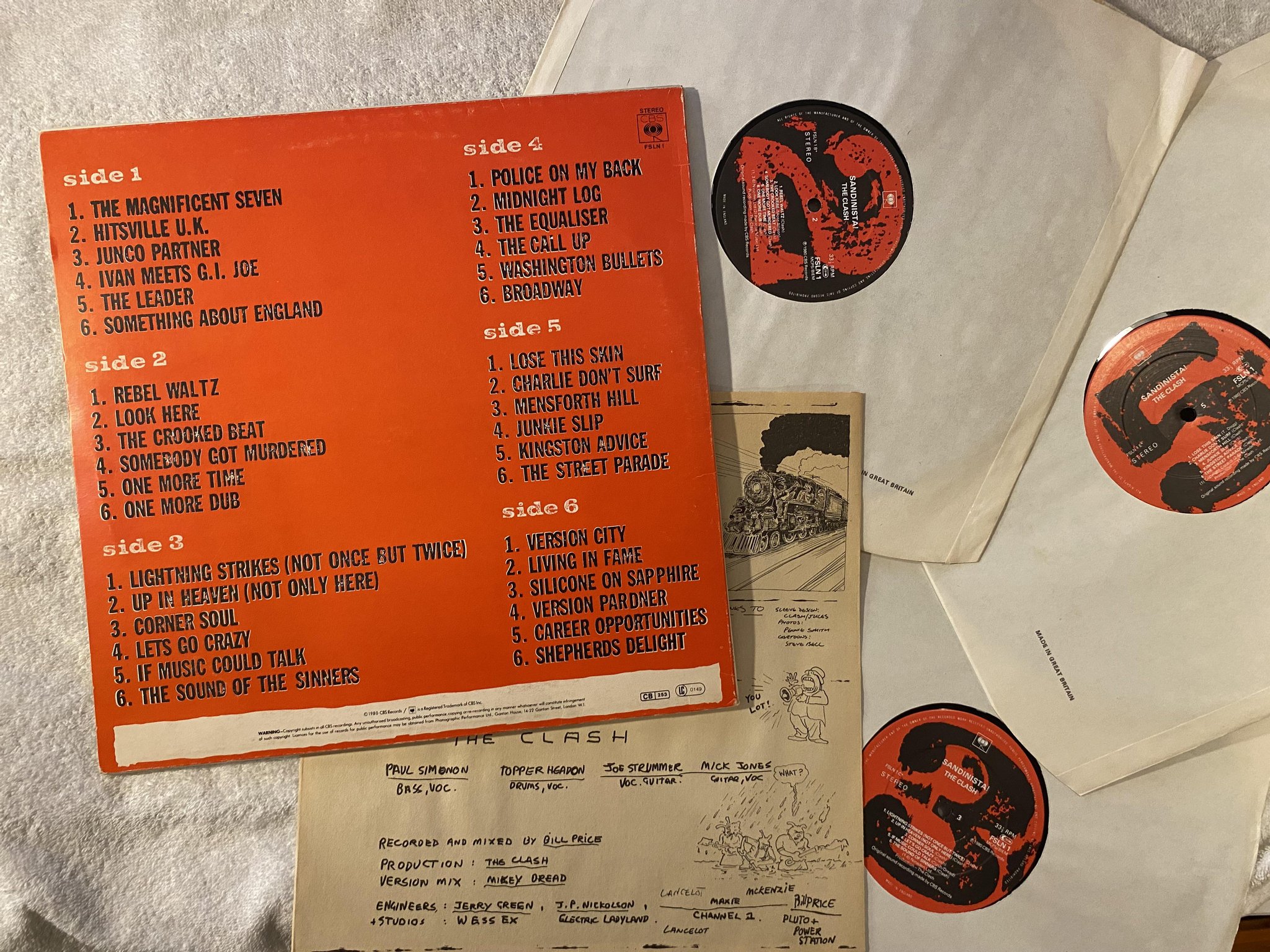 Omslagsbild för skivan THE CLASH sandinista! 3xLP -80 UK CBS FSLN 1