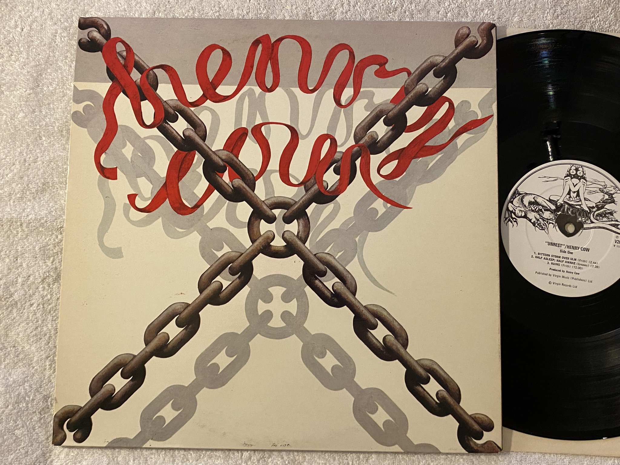 Omslagsbild för skivan HENRY COW Unrest LP -74 VIRGIN V2011 ** AVANTGARDE **