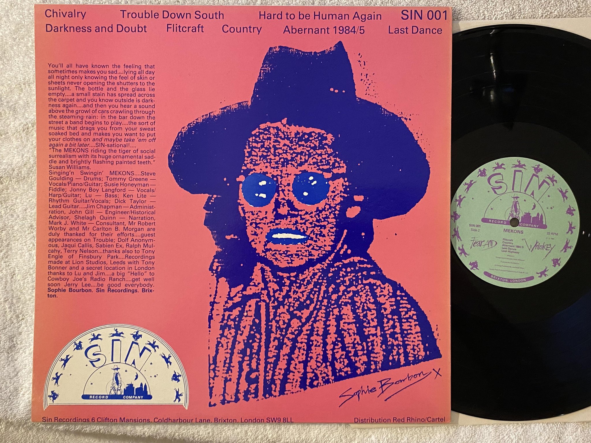 Omslagsbild för skivan MEKONS fear and whiskey LP -85 UK SIN RECORD CO SIN-001