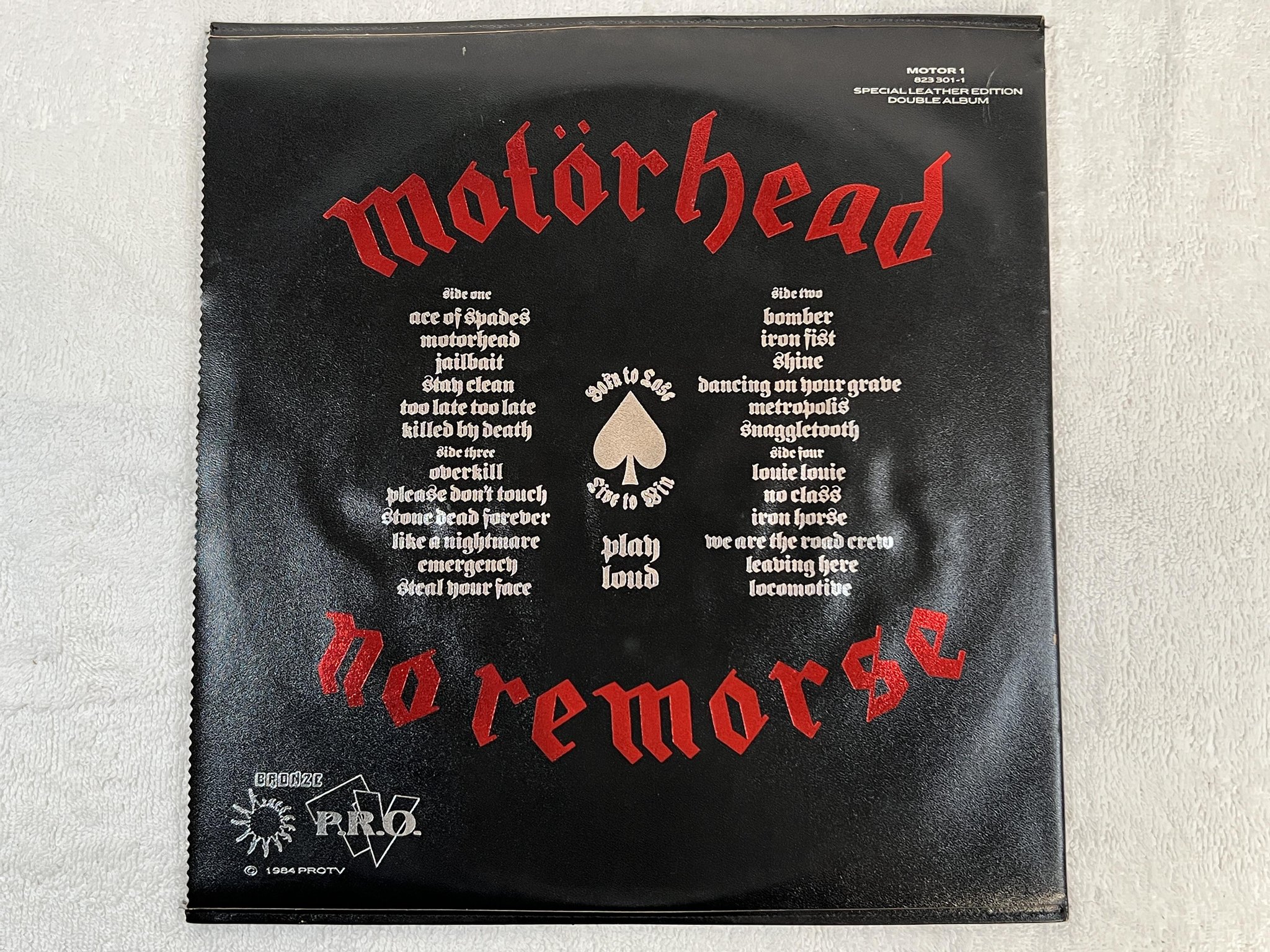 Omslagsbild för skivan MOTÖRHEAD No Remorse 2xLP -84 UK BRONZE MOTOR 1 *** rare leather sleeve ***