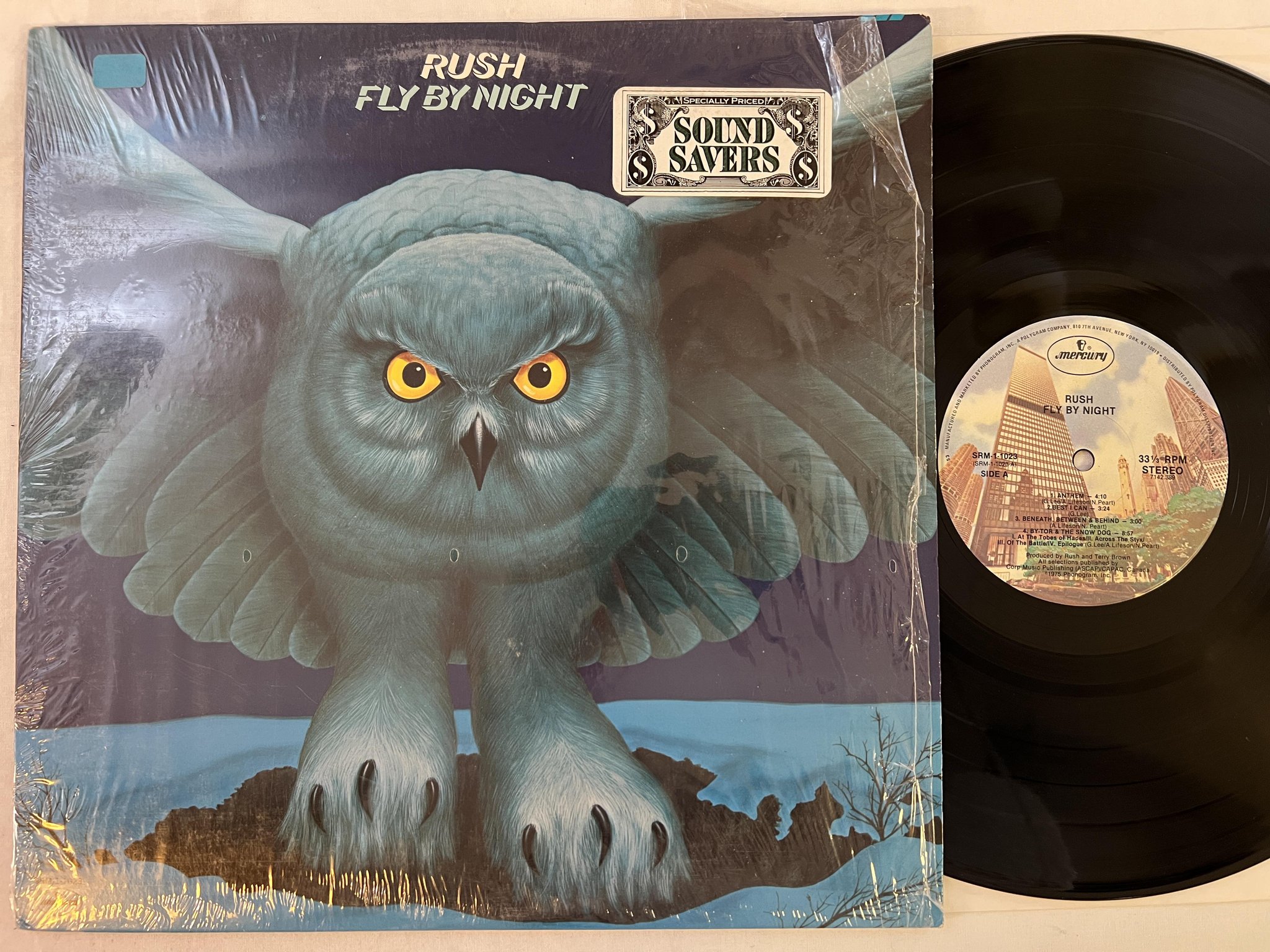 Omslagsbild för skivan RUSH fly by night LP -75 US MERCURY SRM-1-1023